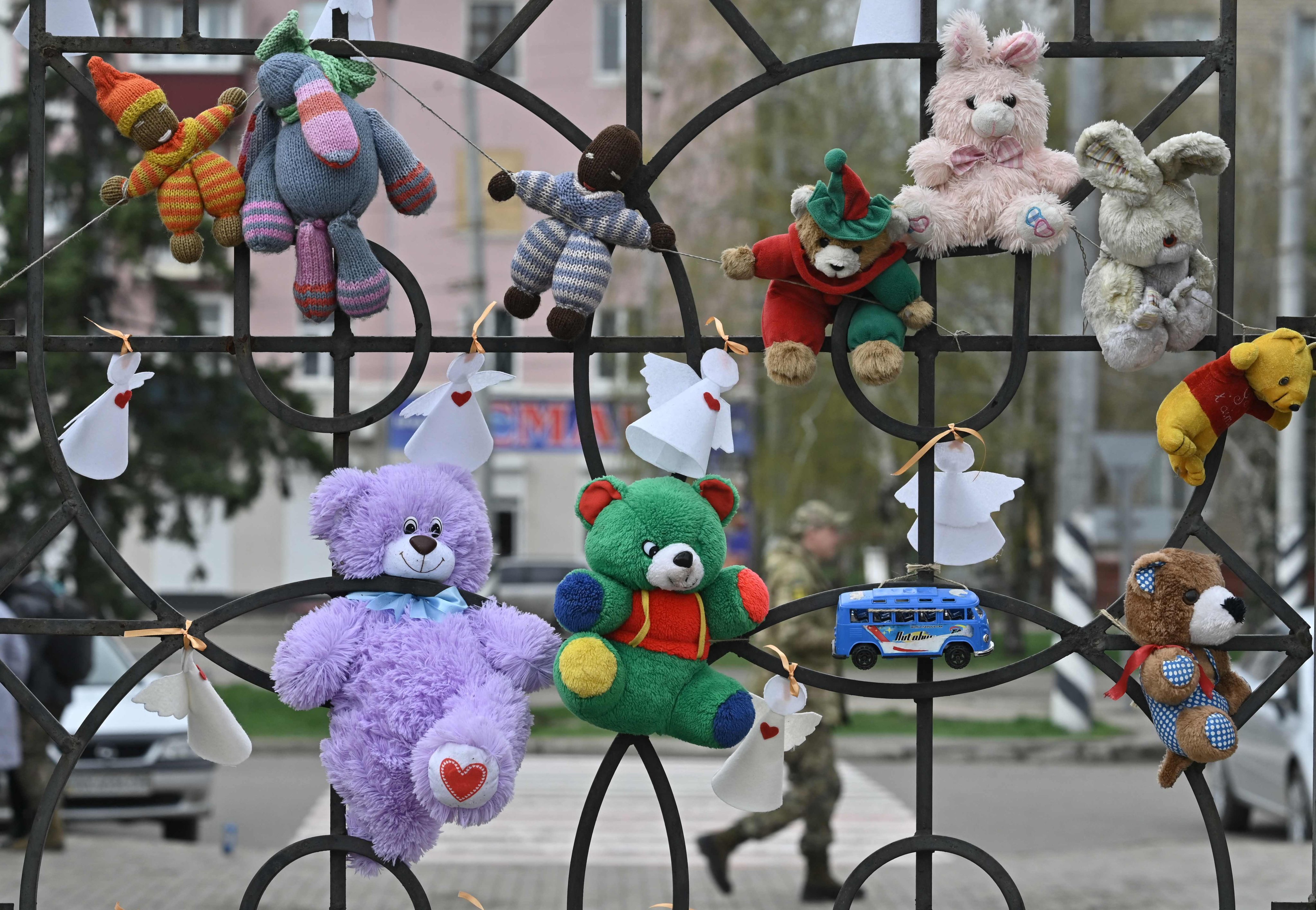 Children’s toys on a fence at the train station in Kramatorsk, Ukraine on Saturday. Photo: AFP