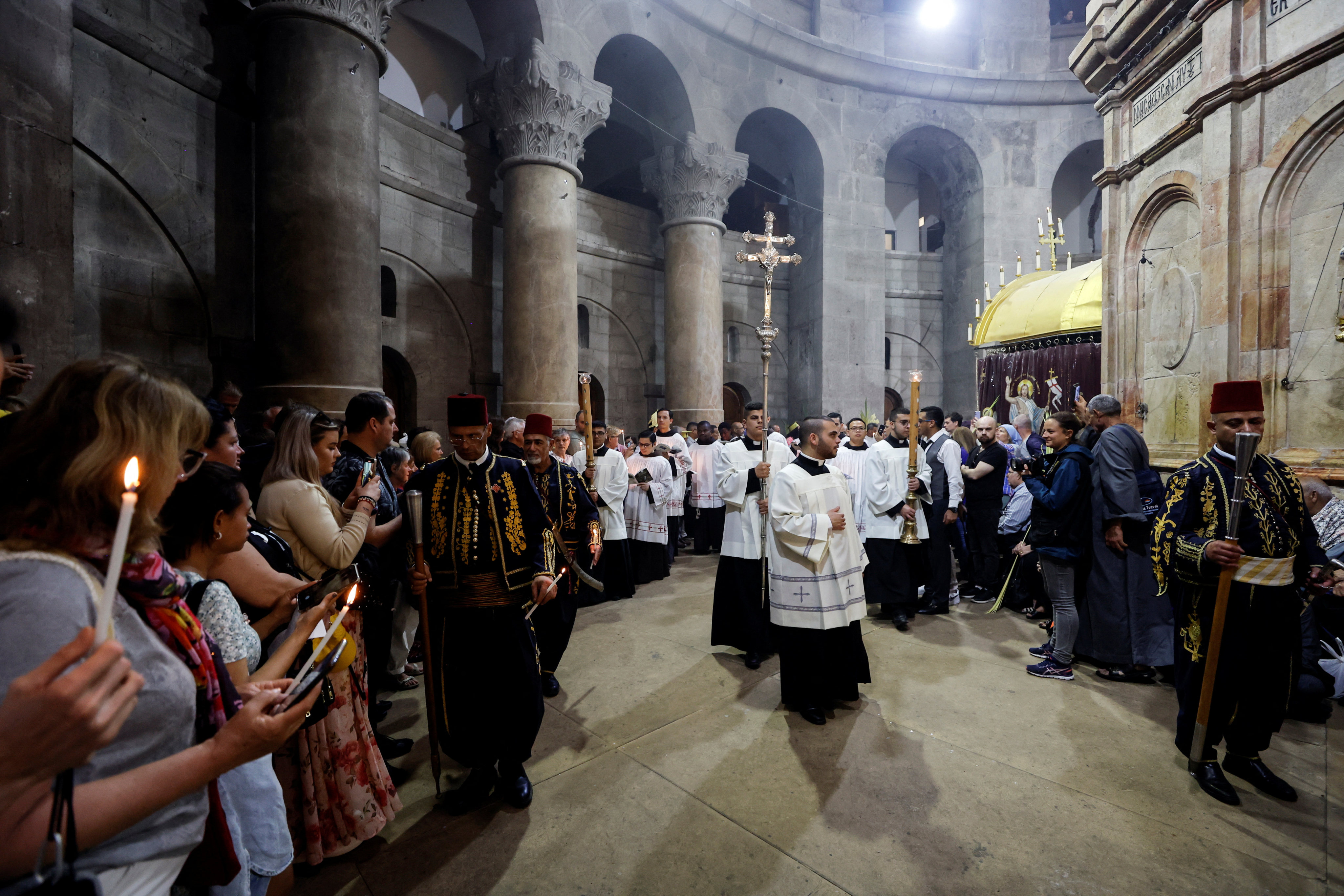 Christian worshippers attend Easter Sunday mass in the Church of the Holy Sepulchre in Jerusalem’s Old City on Sunday. Photo: Reuters