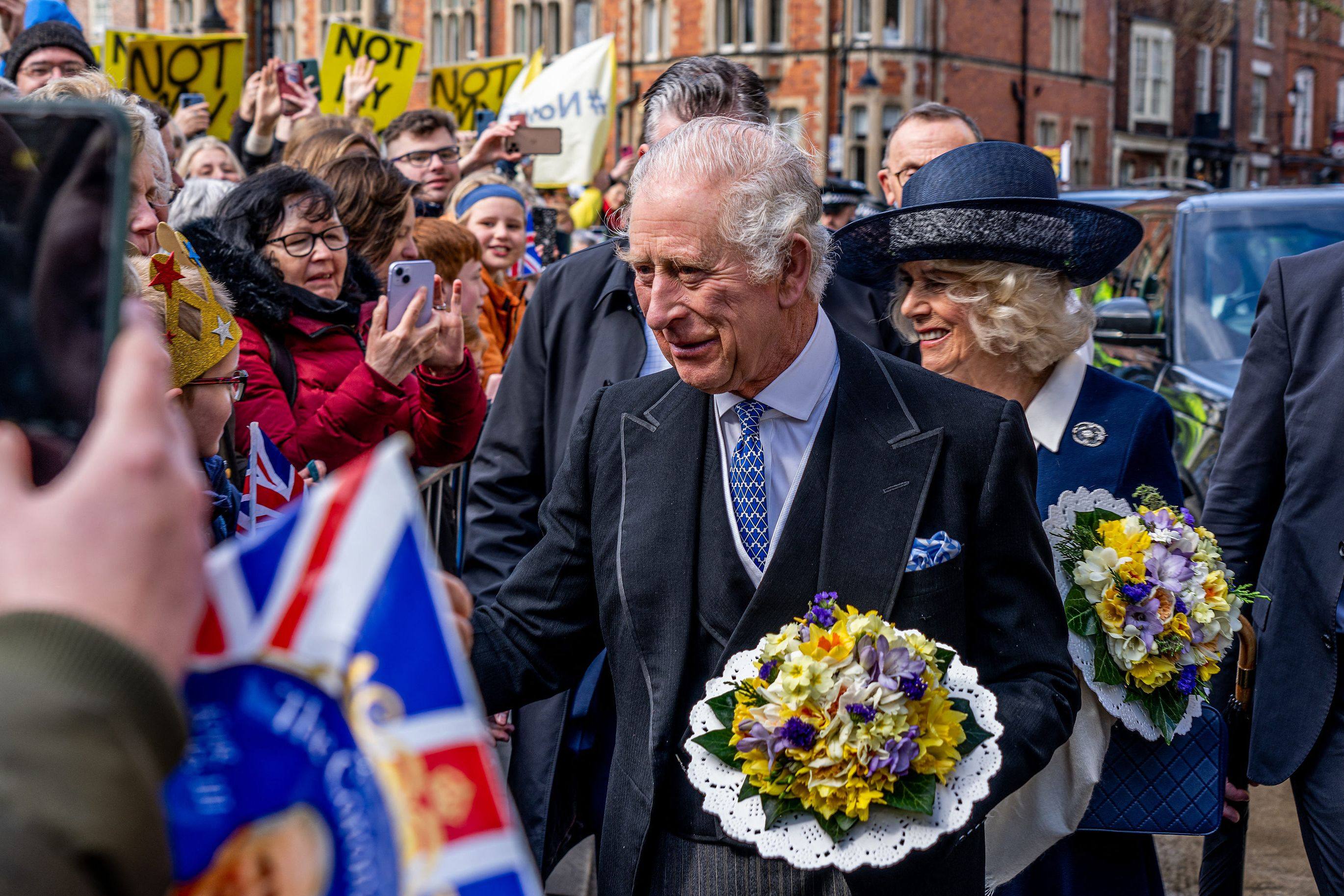 Britain’s King Charles and his wife Camilla speak to well-wishers in York Minster, England on Thursday. Photo: AFP