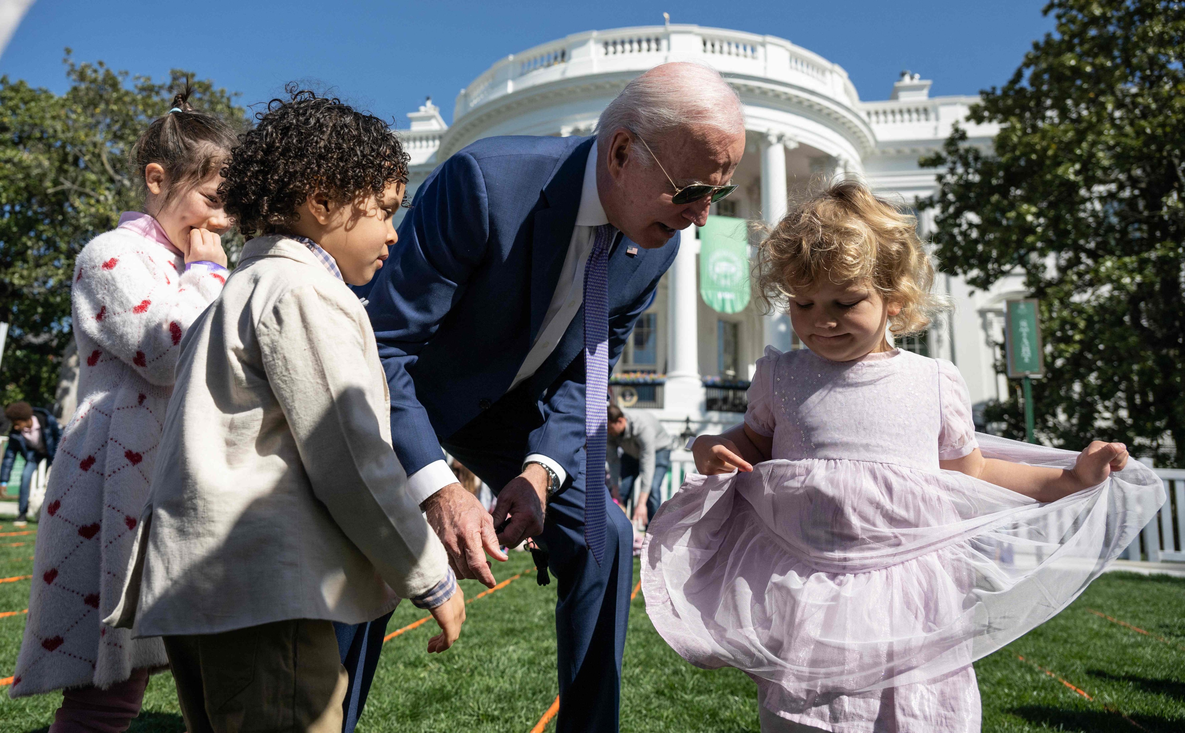 US President Joe Biden speaks to children at the Easter Egg Roll at the White House on Monday. The theme of this year’s event is ‘EGGucation’. Photo: AFP