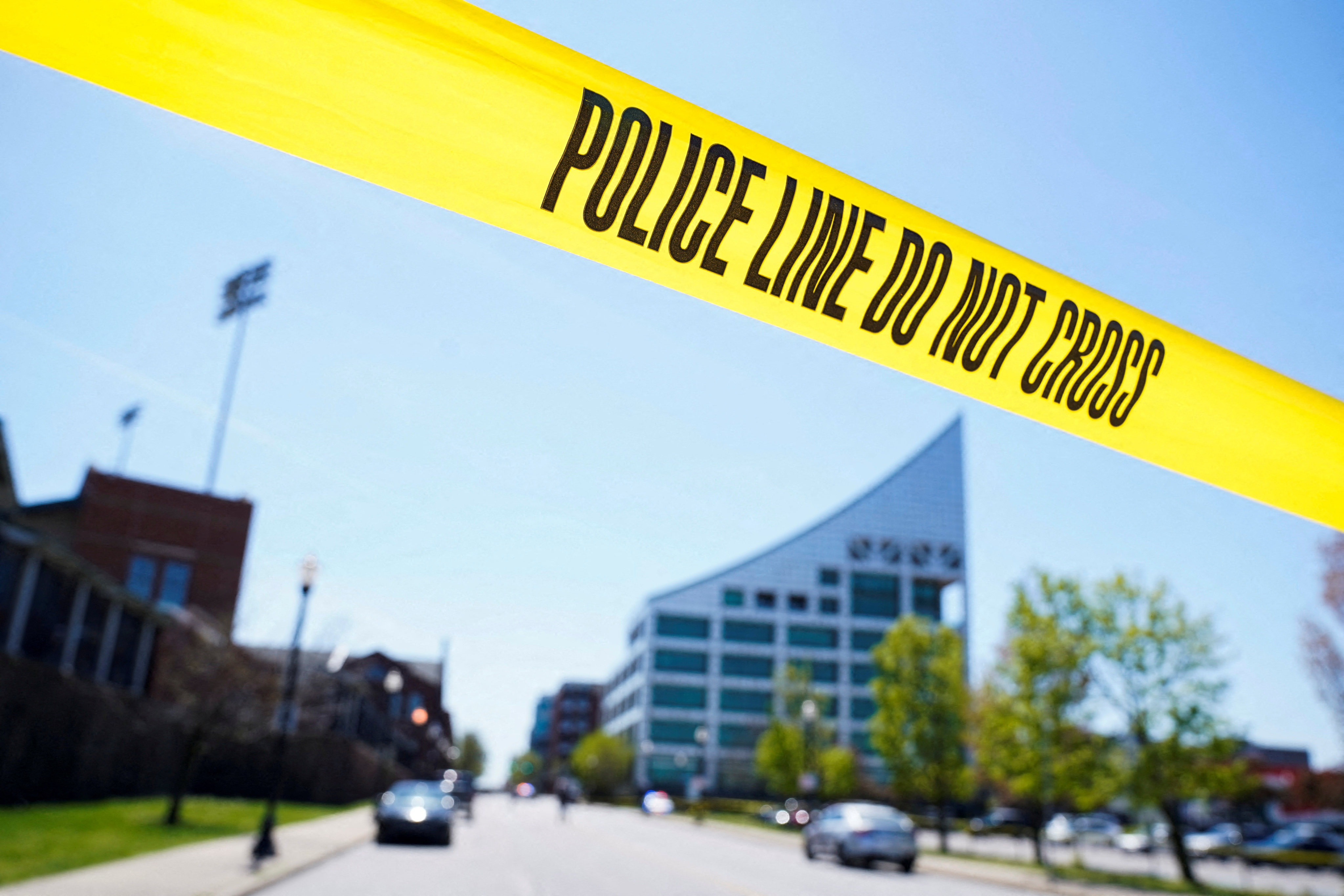 Police tape is seen at the scene of a mass shooting outside an Old National Bank branch near Slugger Field baseball stadium in downtown Louisville, Kentucky, on Monday. Photo: Reuters