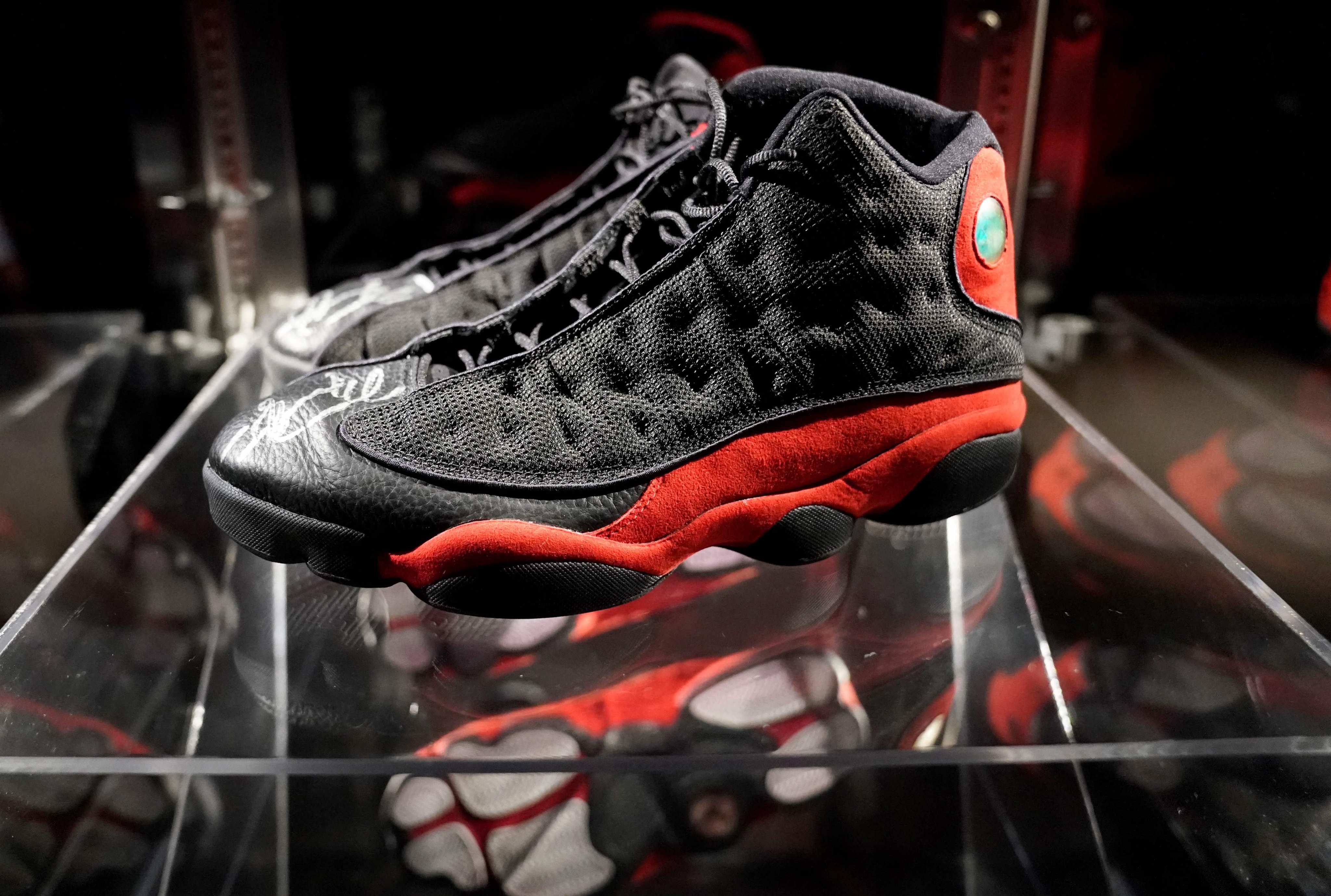 Michael Jordan's game-worn 1998 Air Jordans sell at auction for record  $2.24 million - ABC News