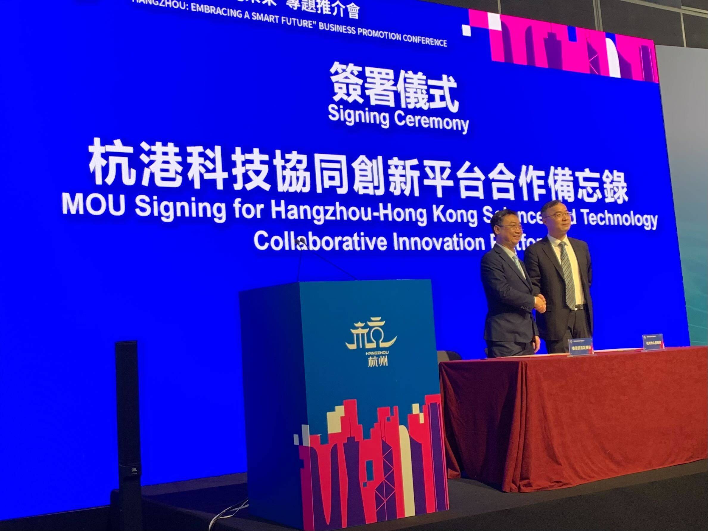 Jacky Chung (left), director of Chinese Mainland at the Hong Kong Trade Development Council, and Hangzhou’s  deputy mayor Sun Xudong sign memorandums of understanding in Hong Kong on April 12, 2023. Photo: Xinmei Shen