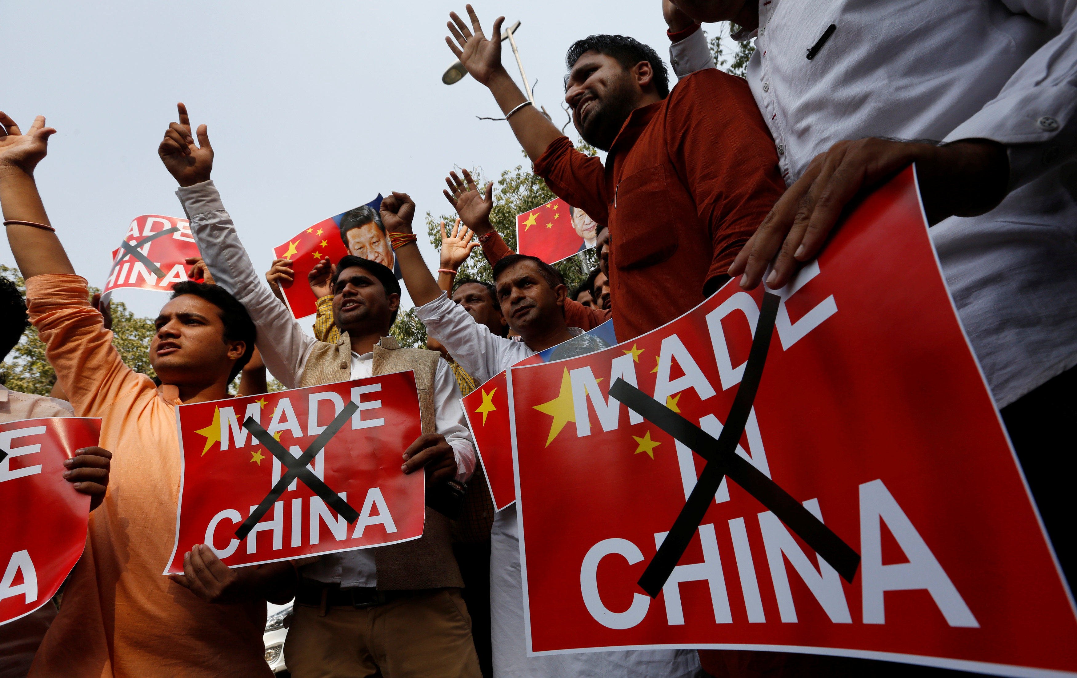Hindu nationalist protesters shout slogans in New Delhi as they demand a boycott of Chinese products in 2016. A new study has found that Chinese imports play a crucial role in India’s economy. Photo: Reuters
