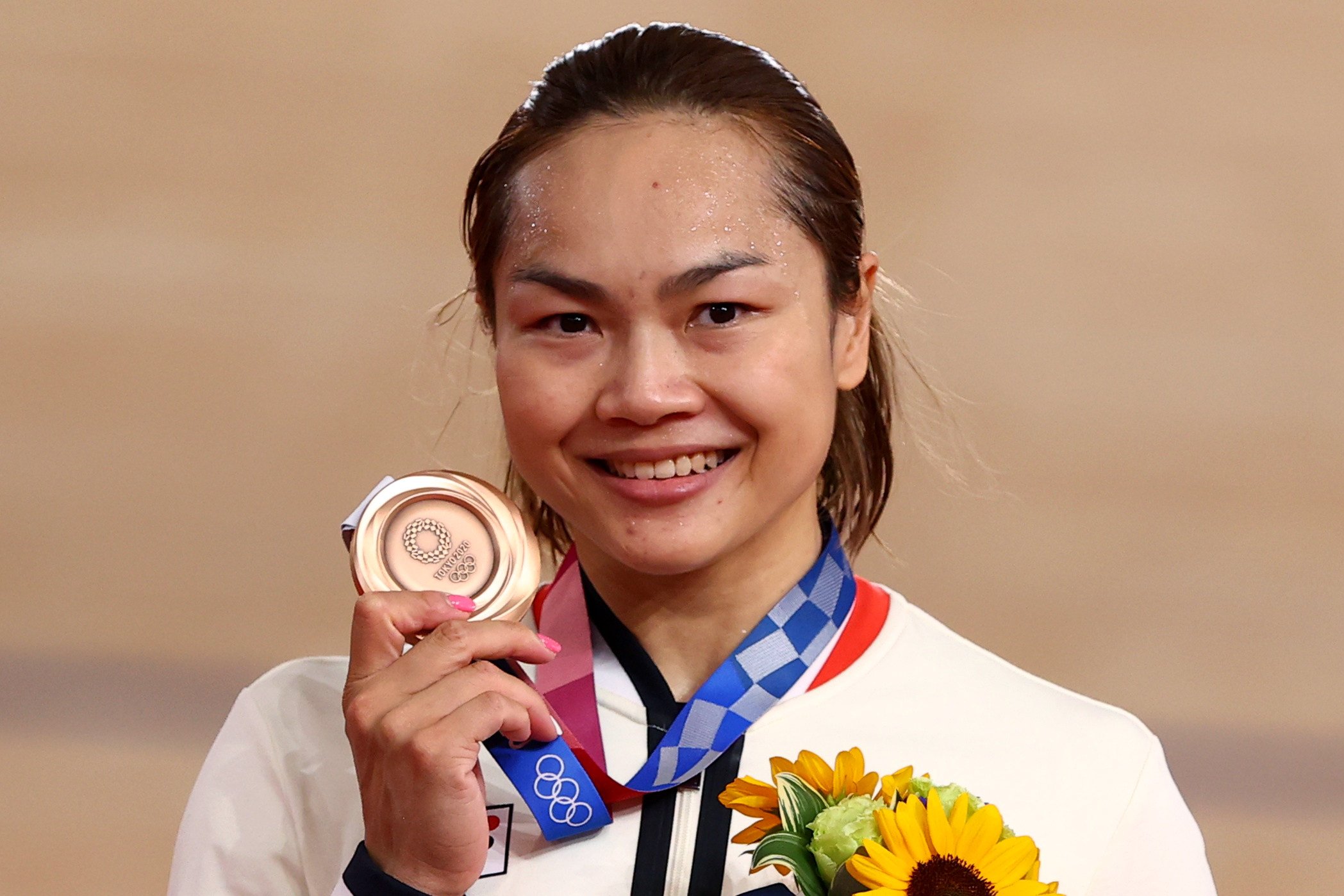 Hong Kong’s Sarah Lee poses with her  bronze medal at the Tokyo Olympics. Photo: Reuters