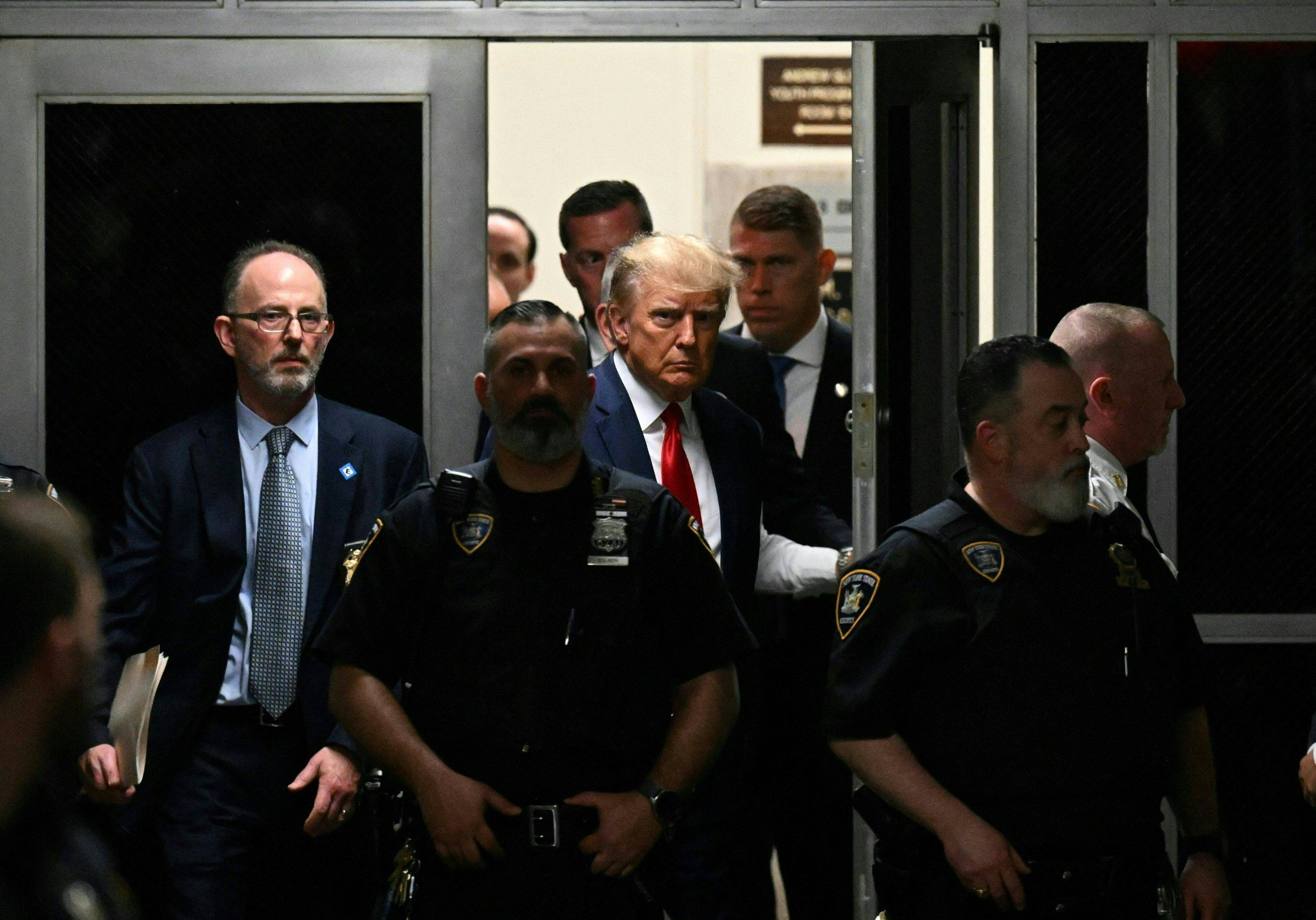 Former US President Donald Trump makes his way inside the Manhattan Criminal Courthouse in New York on April 4. Photo: AFP