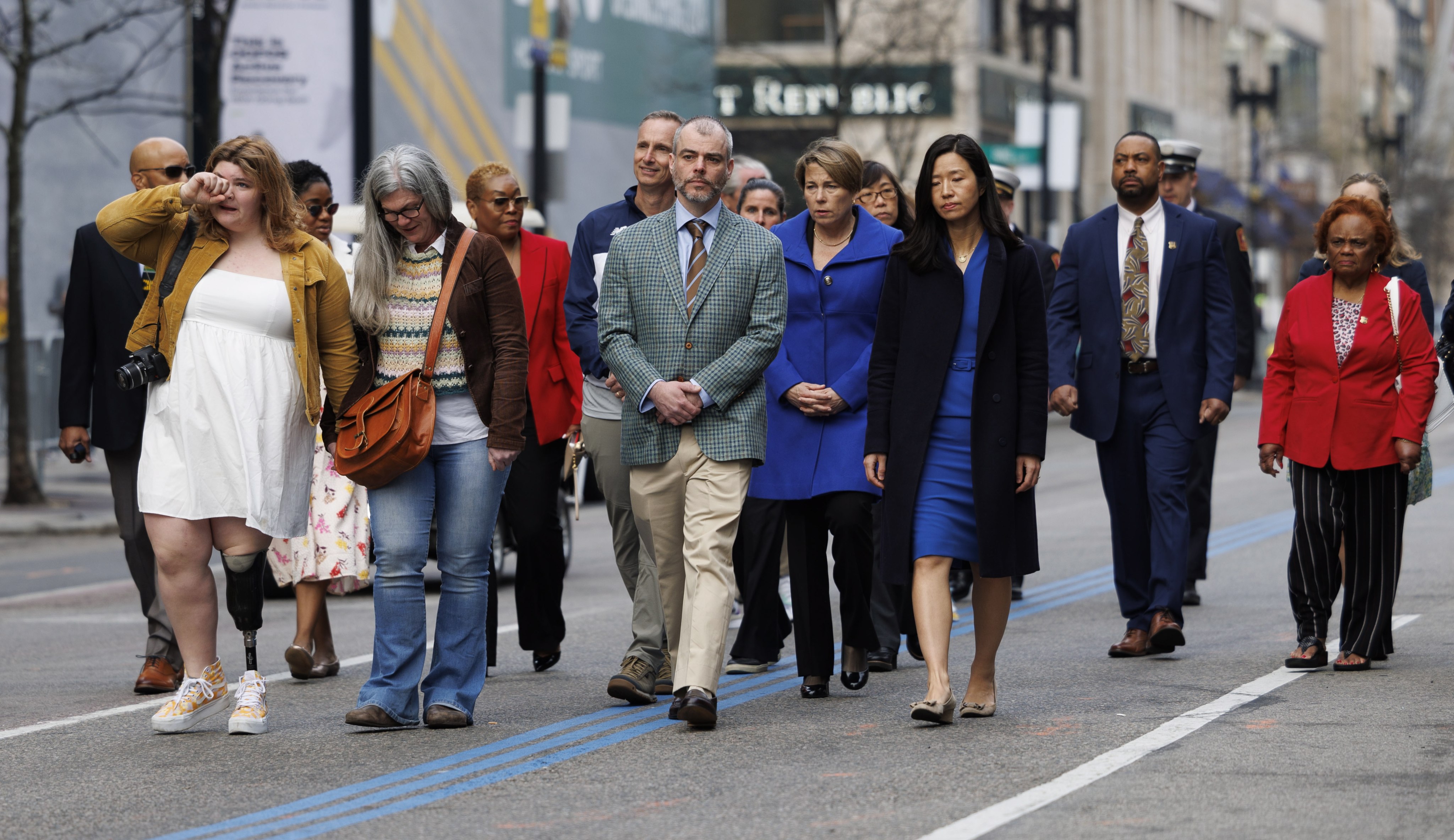 Family members of the victims of the Boston Marathon bombing walk down Boylston street to one of the two memorial sites on the 10th anniversary in Boston, Massachusetts, US on Saturday. Photo: EPA-EFE