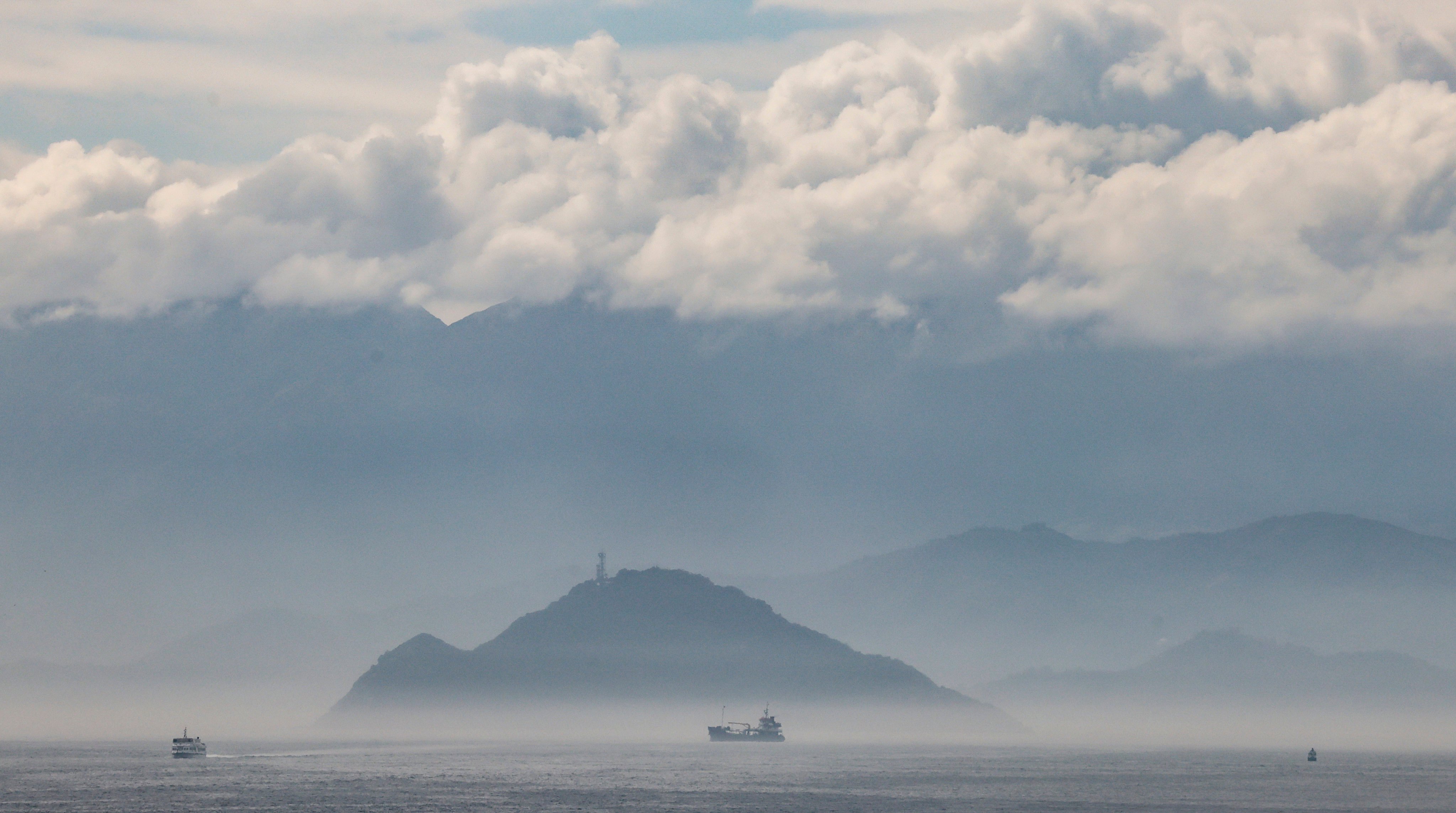 The sea facing Kau Yi Chau is shrouded in mist on February 10. The government has proposed to construct three artificial islands around Kau Yi Chau. Photo: Jelly Tse