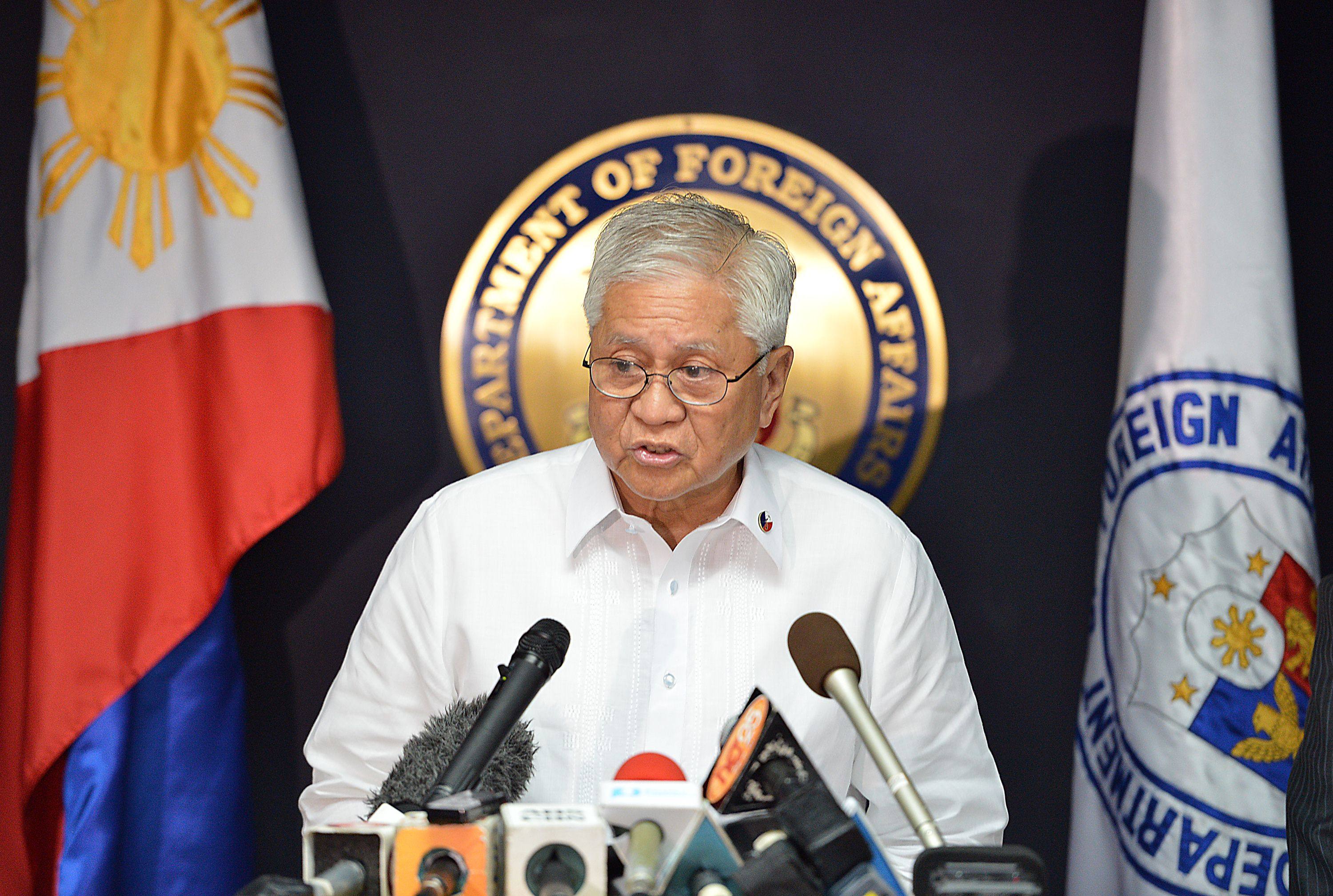 Albert del Rosario, the Philippines then-foreign minister, reads a statement at a press conference in Manila in 2013. Photo: AFP