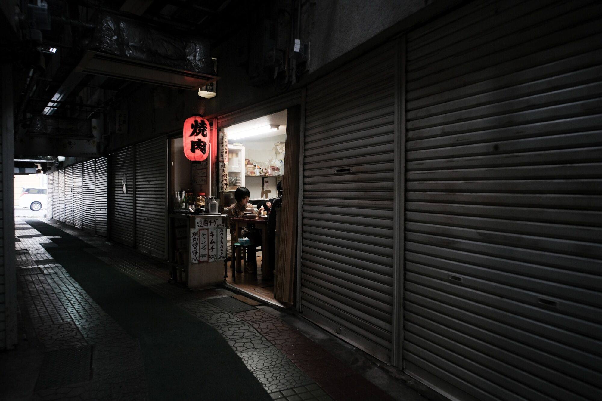 Customers dine at a restaurant in the Chuo Market in Kitakyusyu, Fukuoka, on March 21. Japan’s stagnation has had a profound socioeconomic impact. Photo: Bloomberg