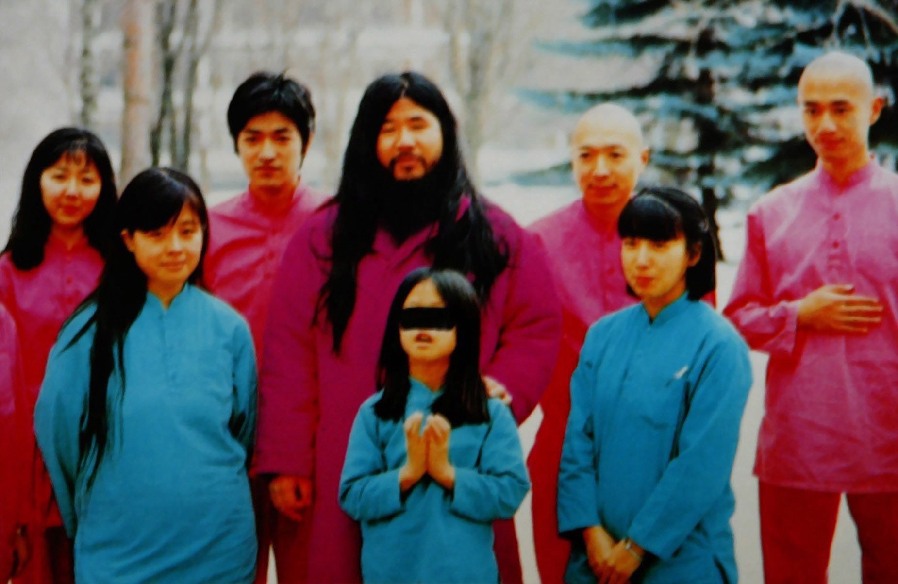 Aum Shinrikyo cult leader Shoko Asahara (centre, back) and members of the group in an undated file photo. Photo: EPA-EFE