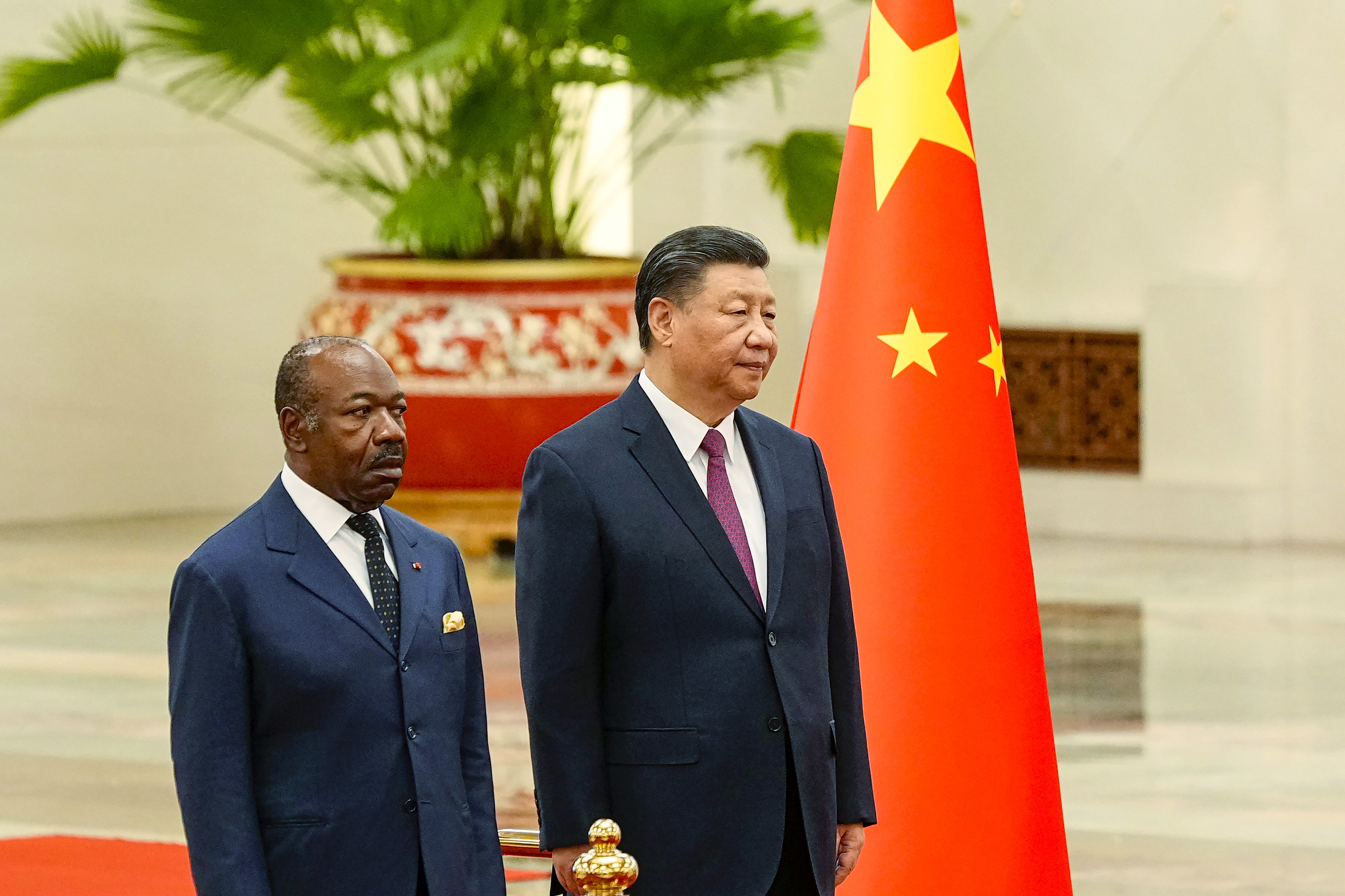 Gabonese President Ali Bongo Ondimba and Chinese leader Xi Jinping inspect an honour guard during a welcome ceremony at the Great Hall of the People in Beijing on Wednesday. Photo: AP