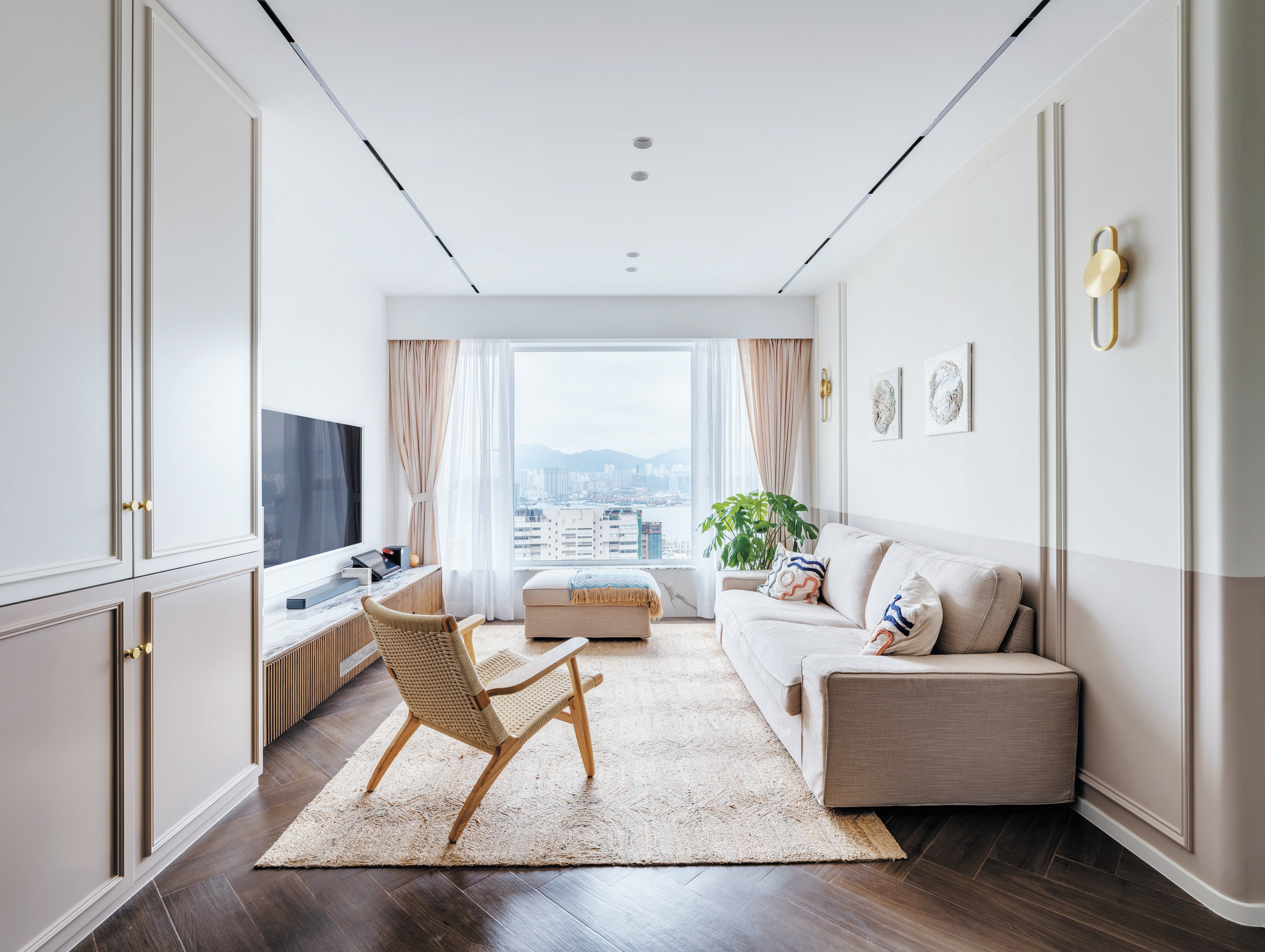 The living room of an apartment in Tin Hau, Hong Kong, that is home to a family of five. A designer demolished everything in the 50-year-old flat to create a home with mid-century modern vibes. Photo: Steven Ko 