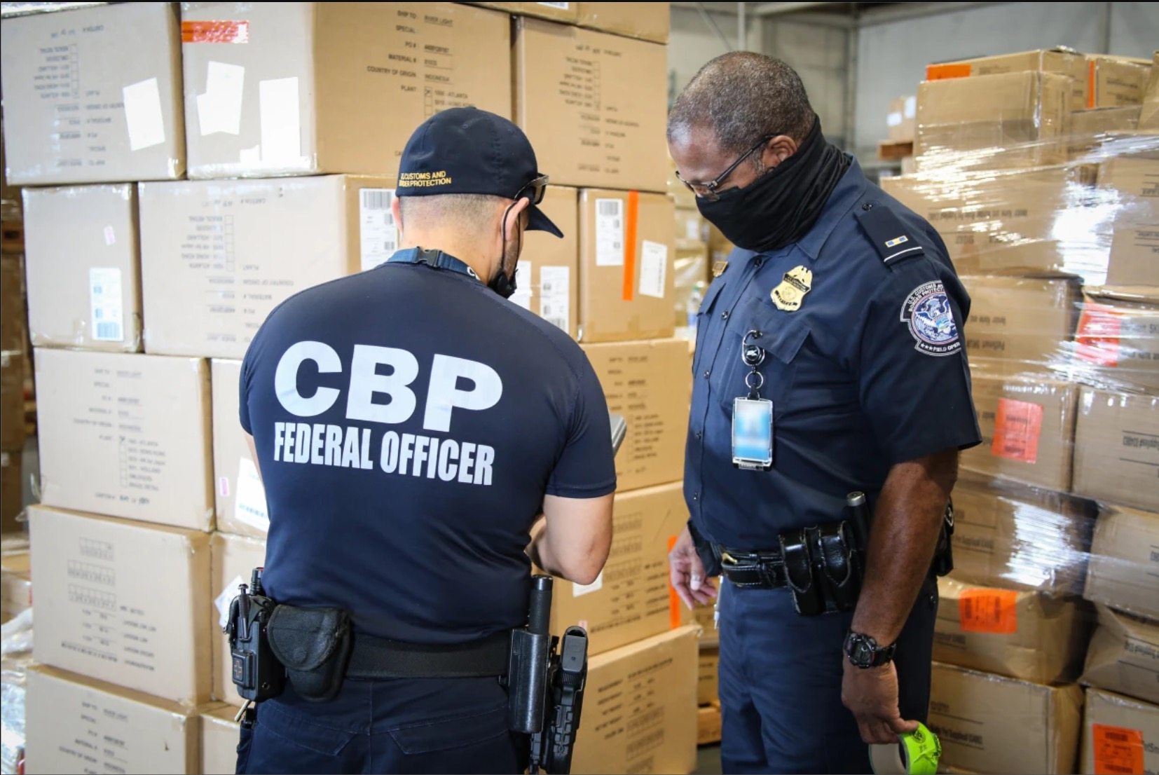 US customs officers inspect apparel suspected to have been made with cotton harvested by forced labour in China’s Xinjiang region. Photo: US Customs and Border Protection
