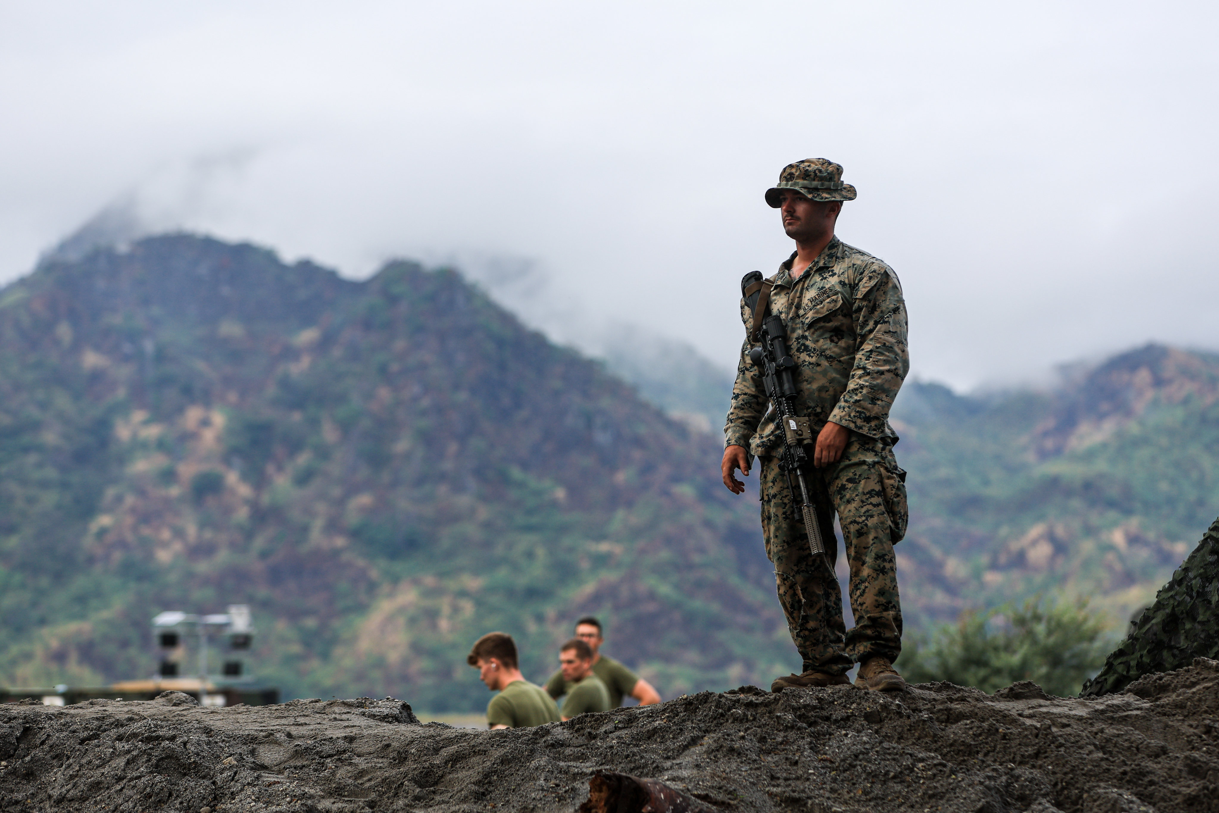 US soldier stands guard at a military base during live fire exercise during the US-Philippines Balikatan military drills. Photo: dpa