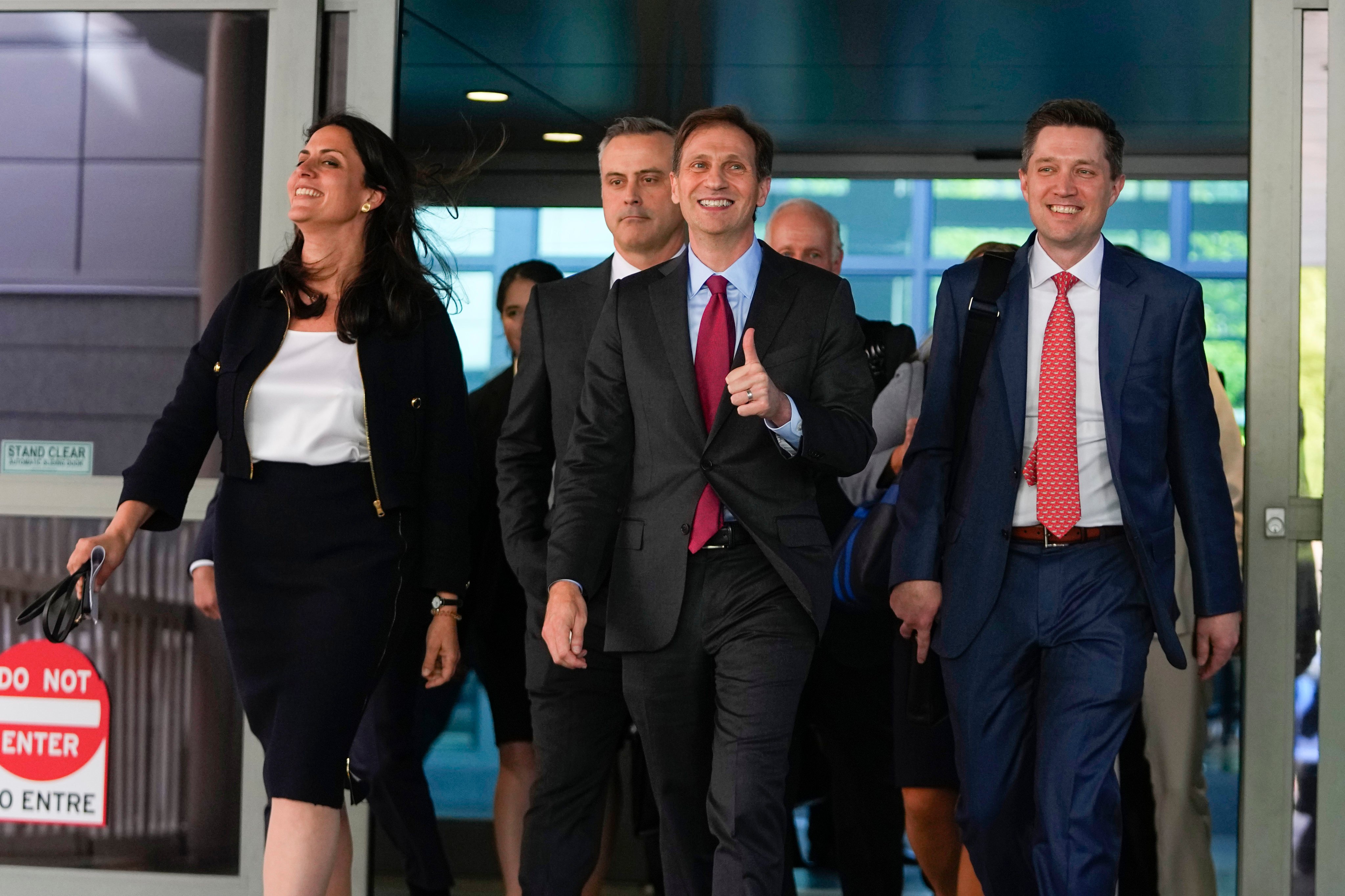 Lawyers for Dominion Voting Systems exit the New Castle County Courthouse in Wilmington, Delaware, after the defamation lawsuit was settled. Photo: AP
