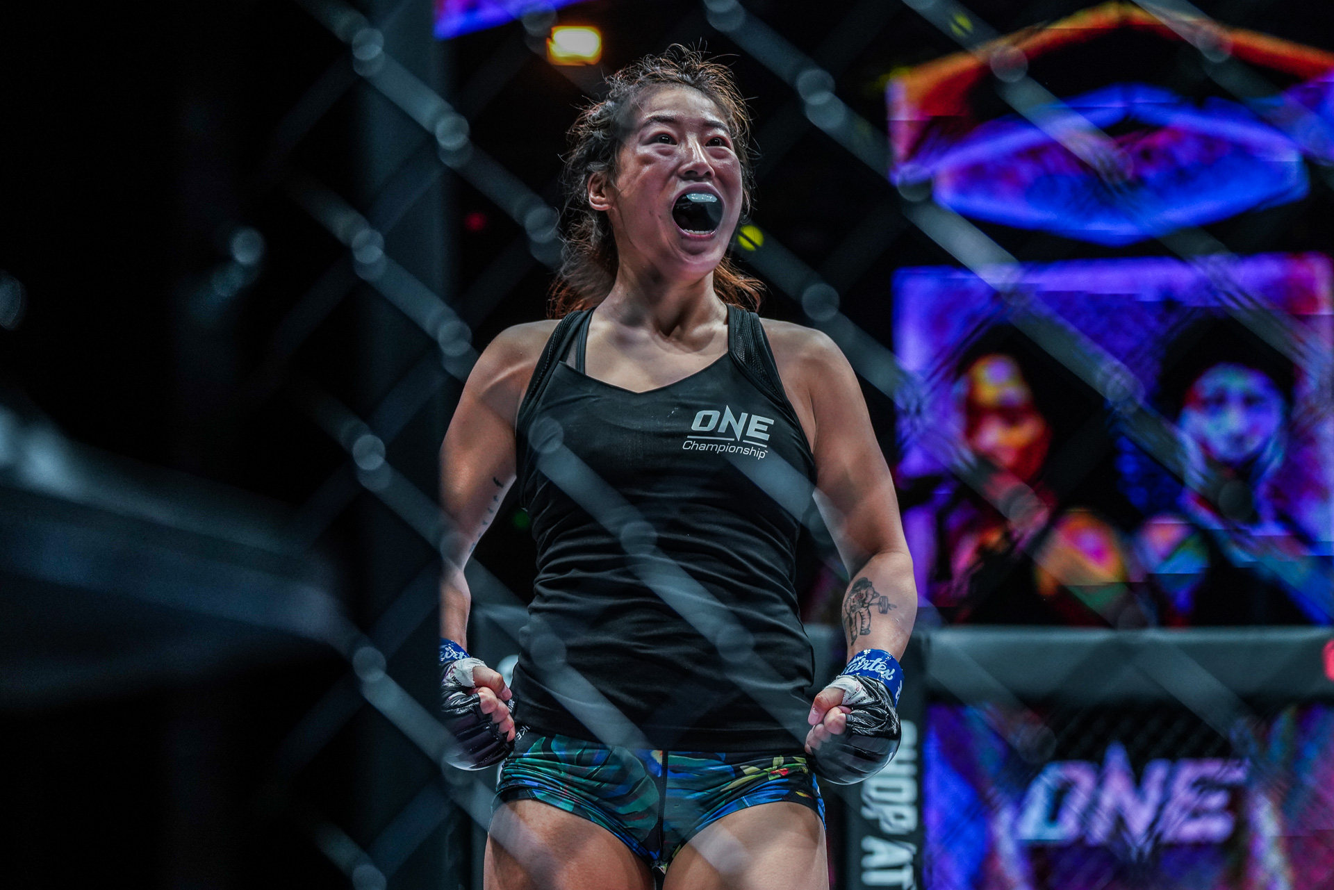 Meng Bo celebrates a quick knockout win over Jenelyn Olsim. Photos: ONE Championship. 