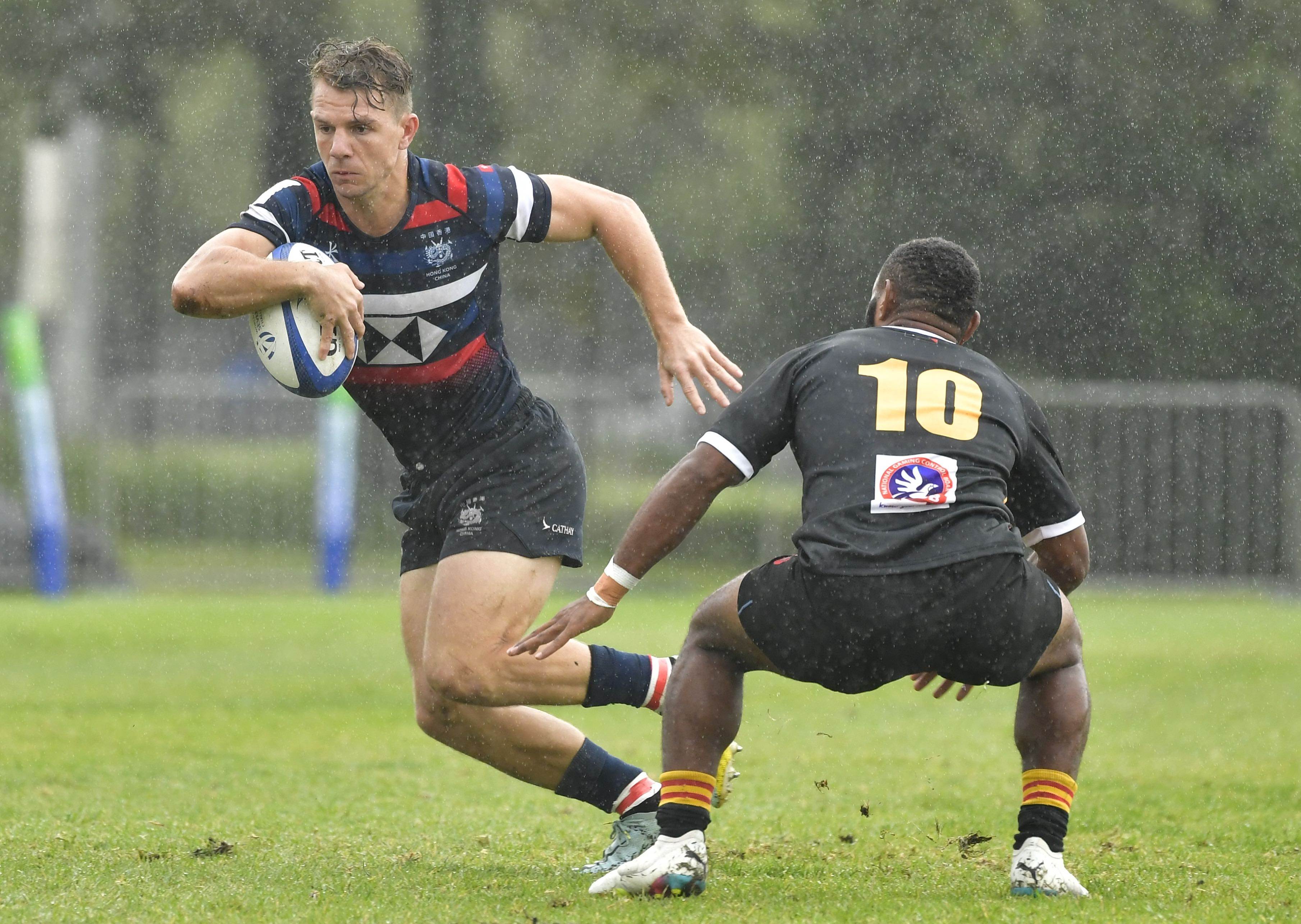 Hong Kong’s Seb Brien attacks in the rain against Papua New Guinea in his side’s first game at the HSBC World Rugby Challenger Series in Stellenbosch, South Africa. Photo: Handout