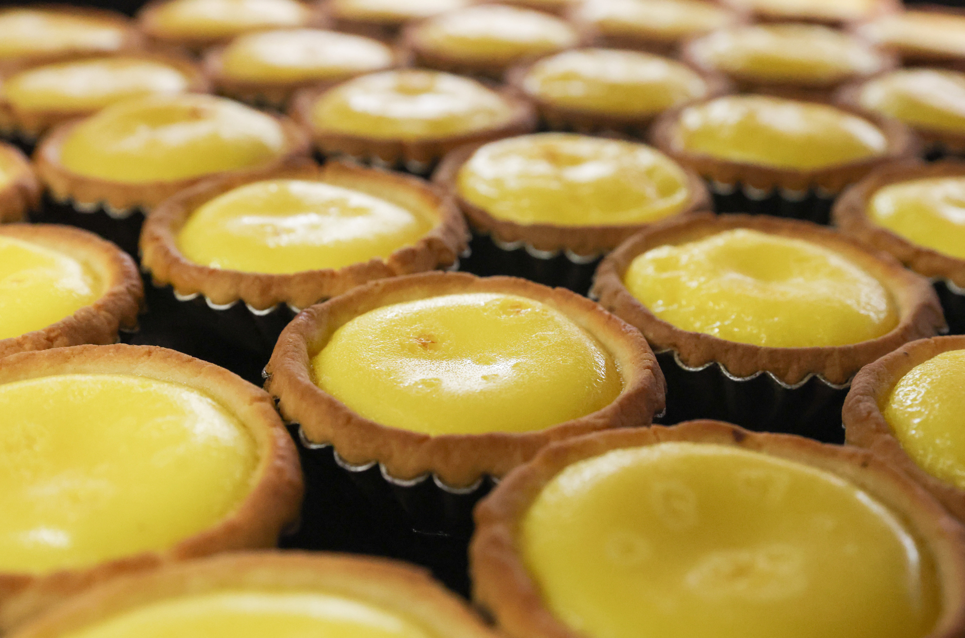 Don’t miss out on egg tarts. They are part of the culinary fabric of the city. Picture: Dickson Lee