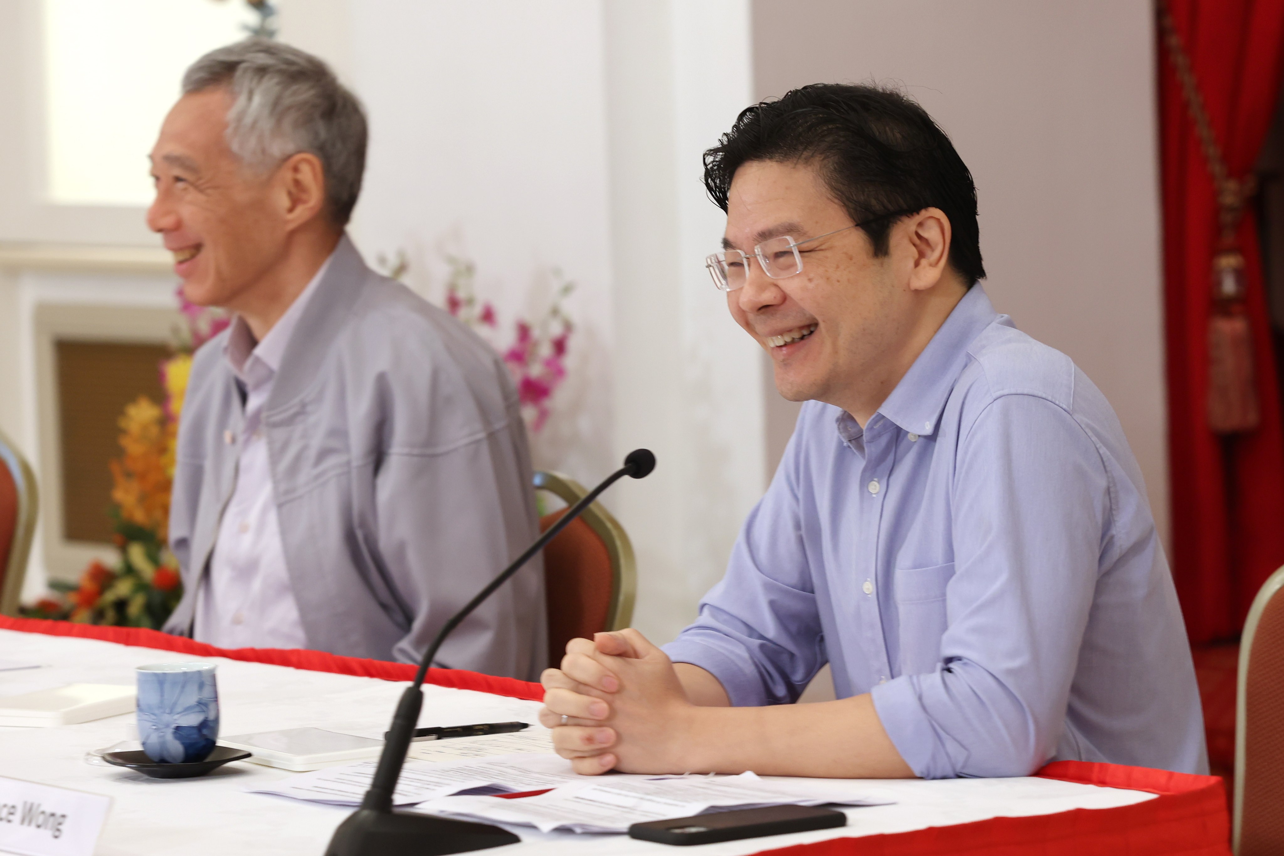 PM Lee Hsien Loong and DPM Lawrence Wong have recently urged citizens to continue to give the PAP broad support. Photo: EPA-EFE