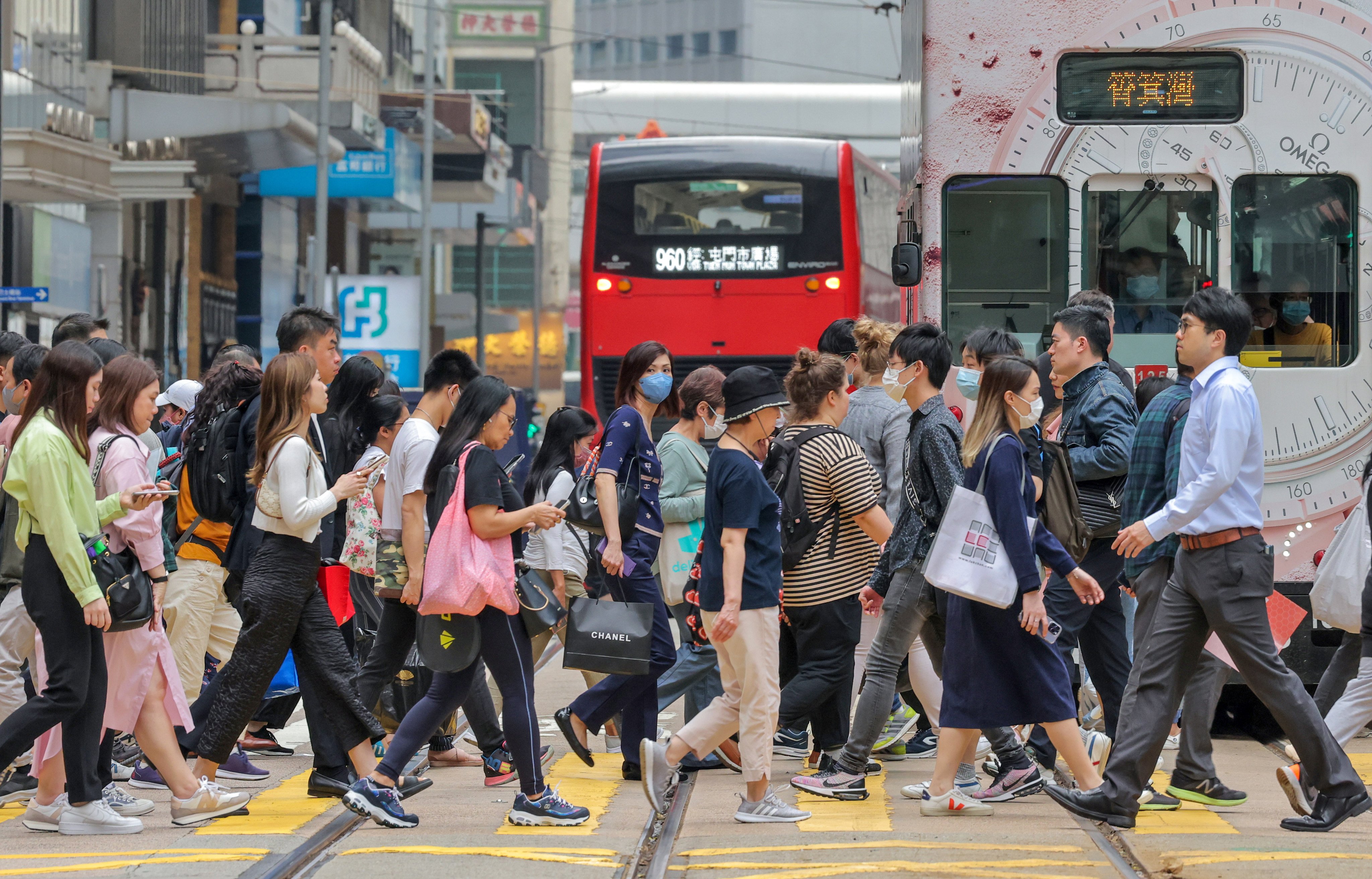Some Hongkongers choosing to wear masks may be helping to keep a flu outbreak under control, says a government health adviser. Photo: Jelly Tse