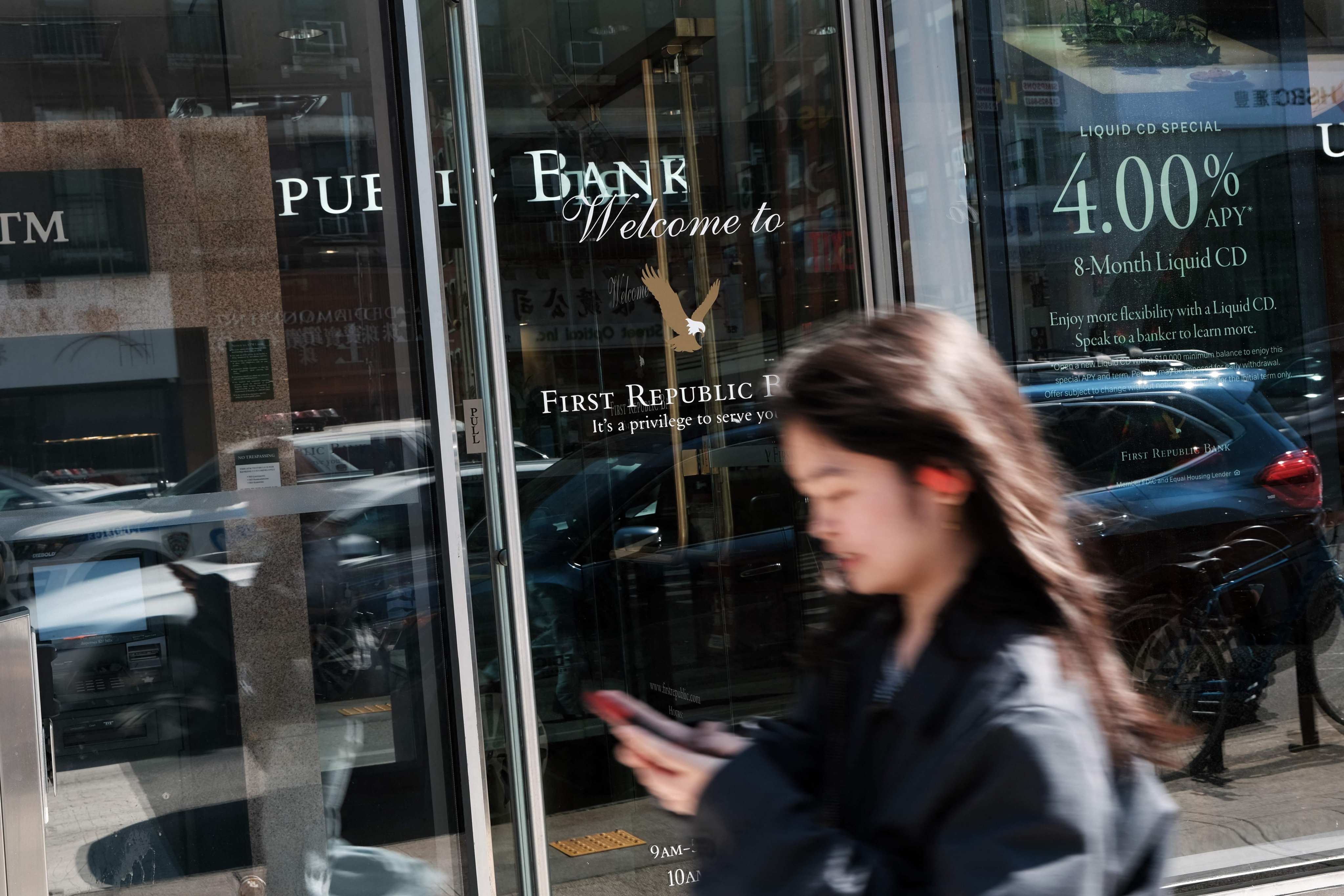 A person walks past a First Republic branch in New York on Monday. Photo: AFP
