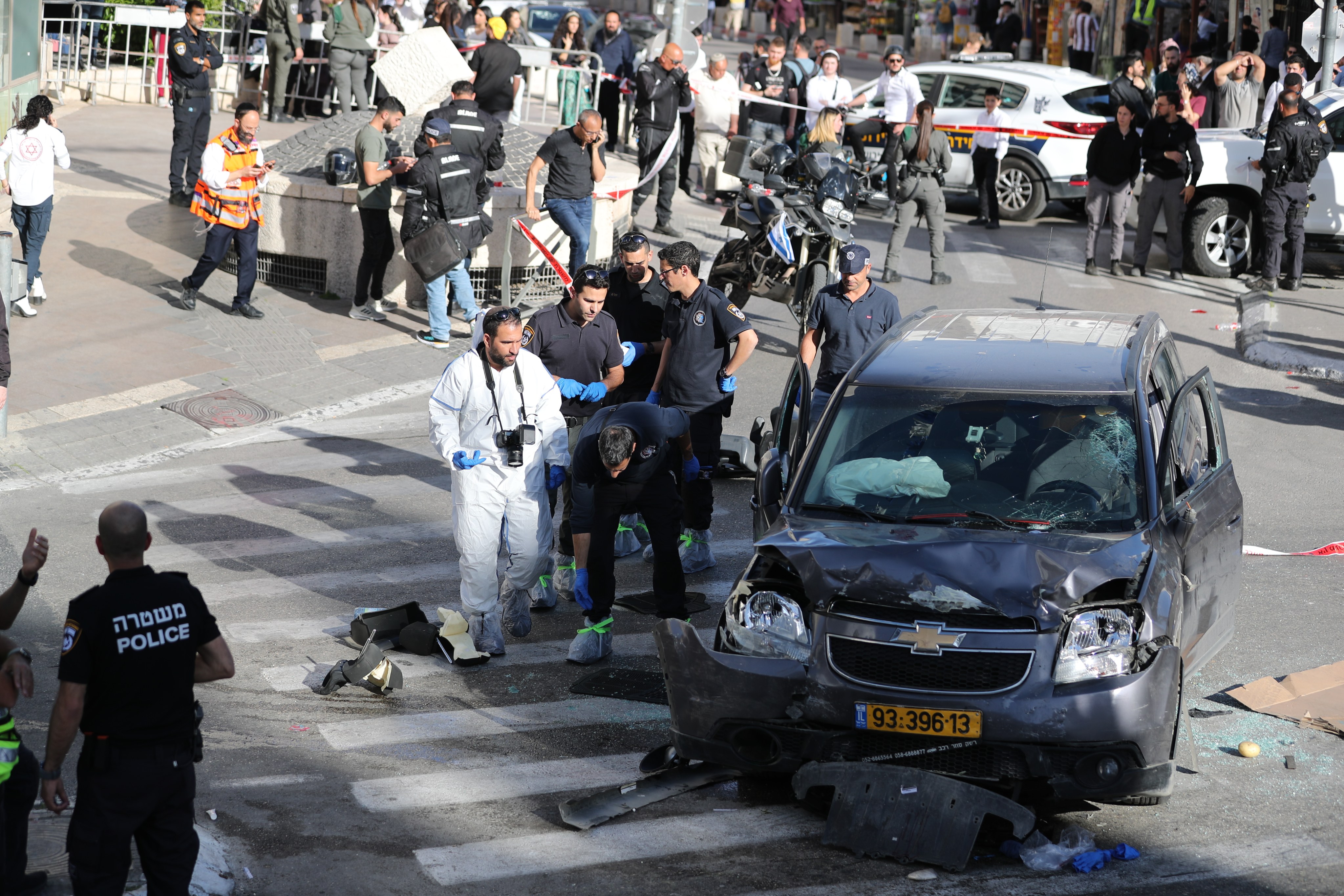 Police work at the scene where a car rammed into a crowd in Jerusalem on Friday. Photo: Xinhua