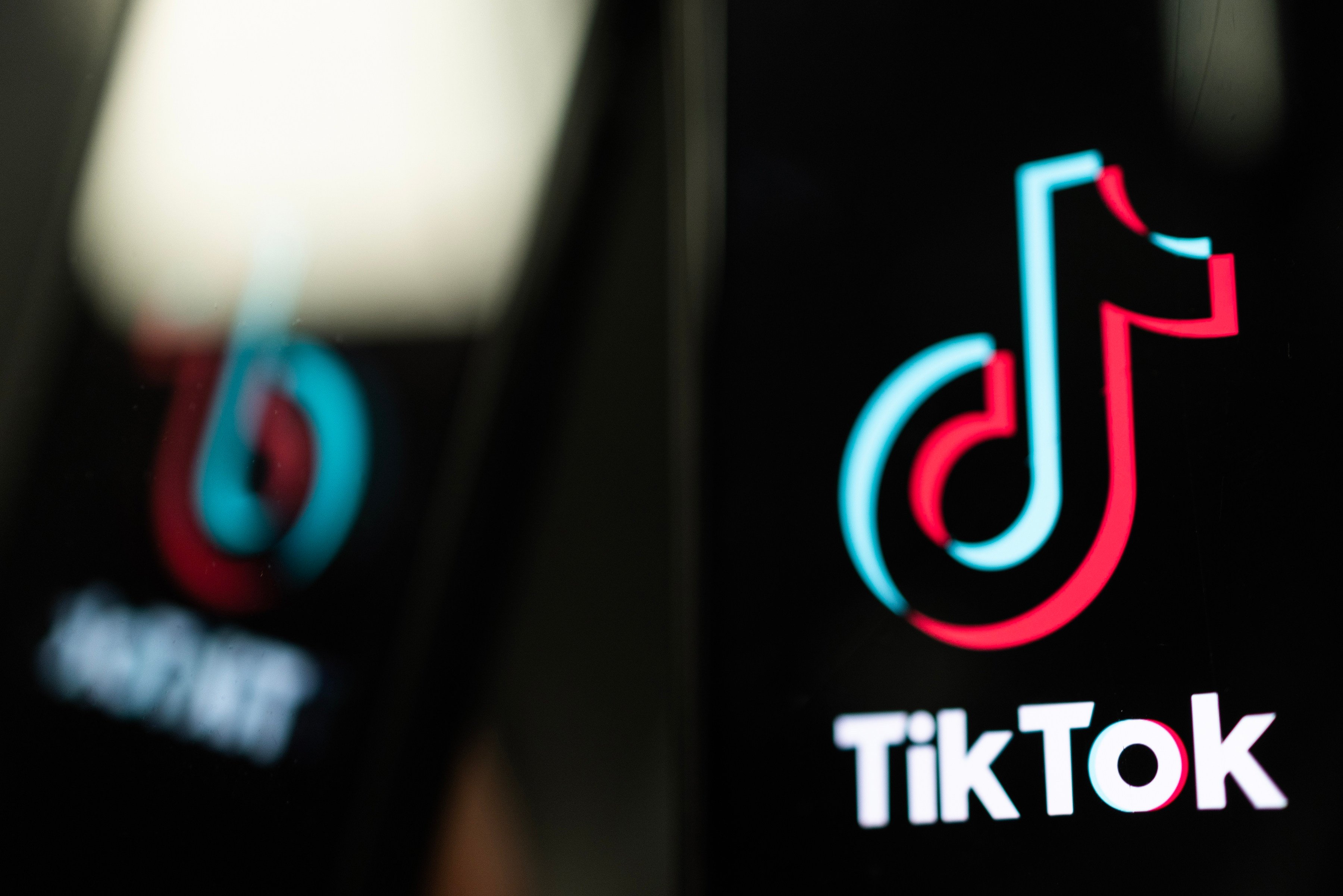 The TikTok logo is displayed on an iPhone screen in London on February 28, 2023. Photo: TNS
