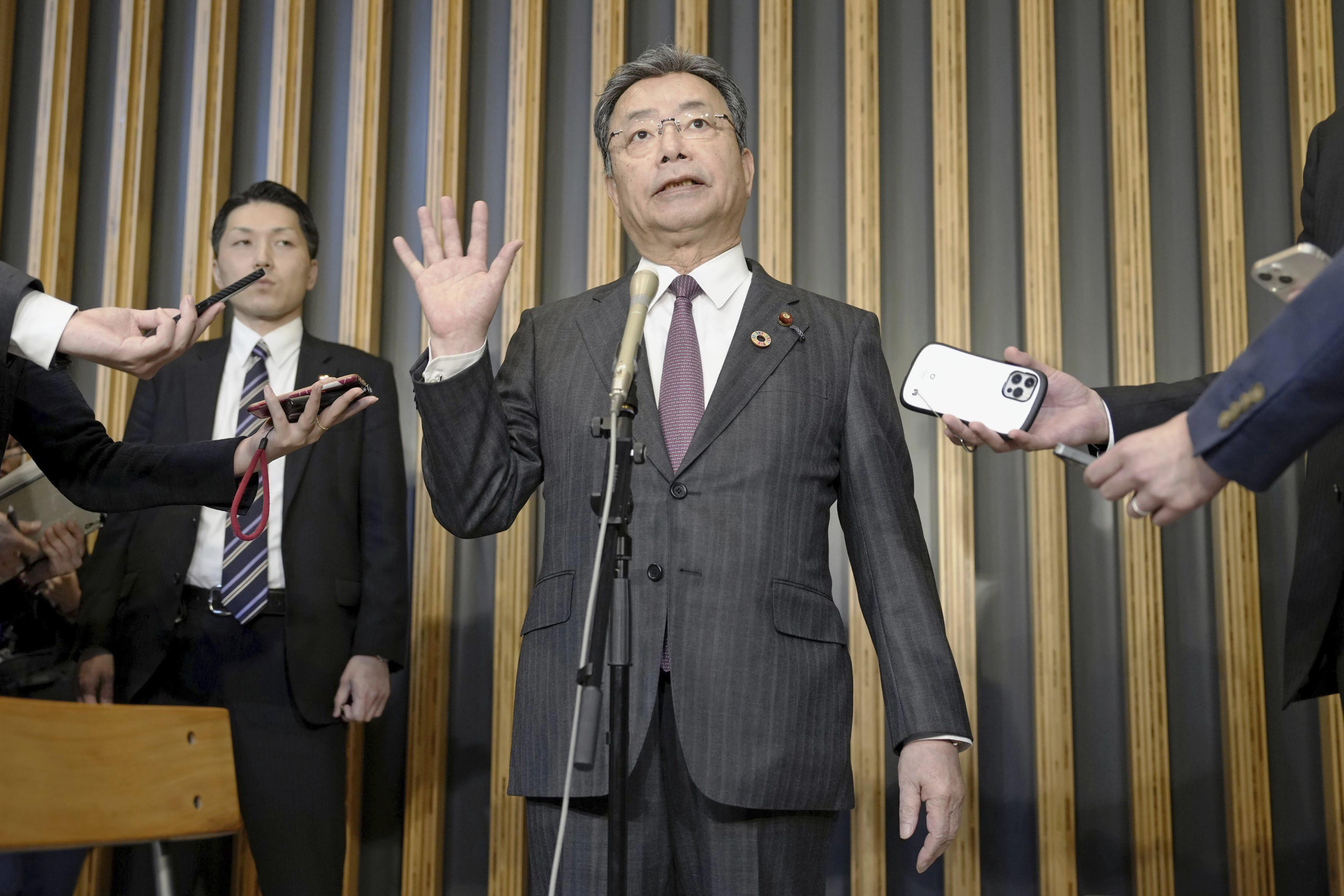 Chairperson of the National Public Safety Commission Koichi Tani has come under fire for his remark that he enjoyed eel rice so much that he kept eating even when his agency informed him of Prime Minister Fumio Kishida’s narrow escape from a pipe bomb attack. Photo: via AP)
