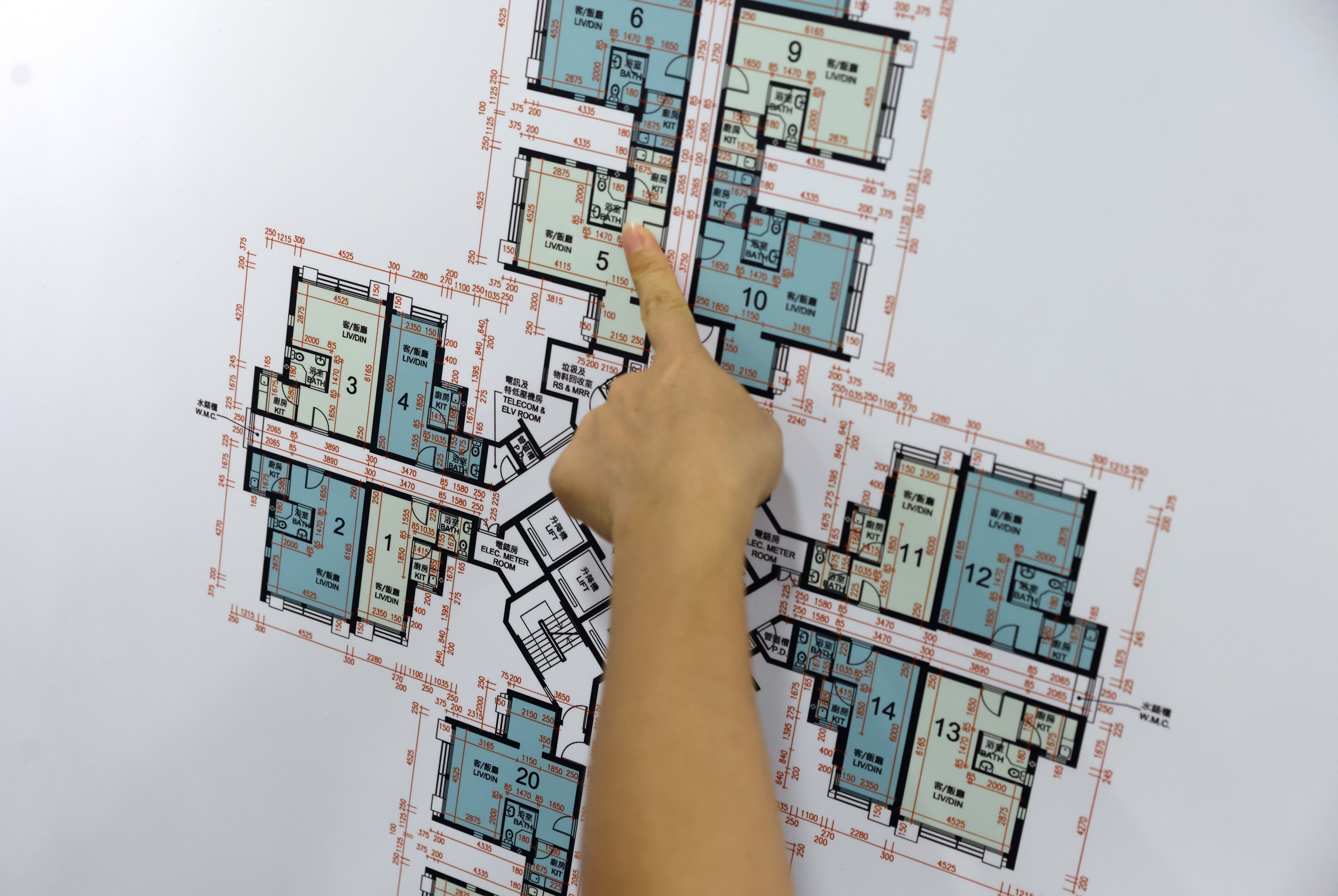 Home Ownership Scheme hopefuls examine floorplans supplied by the Housing Authority. Photo: May Tse