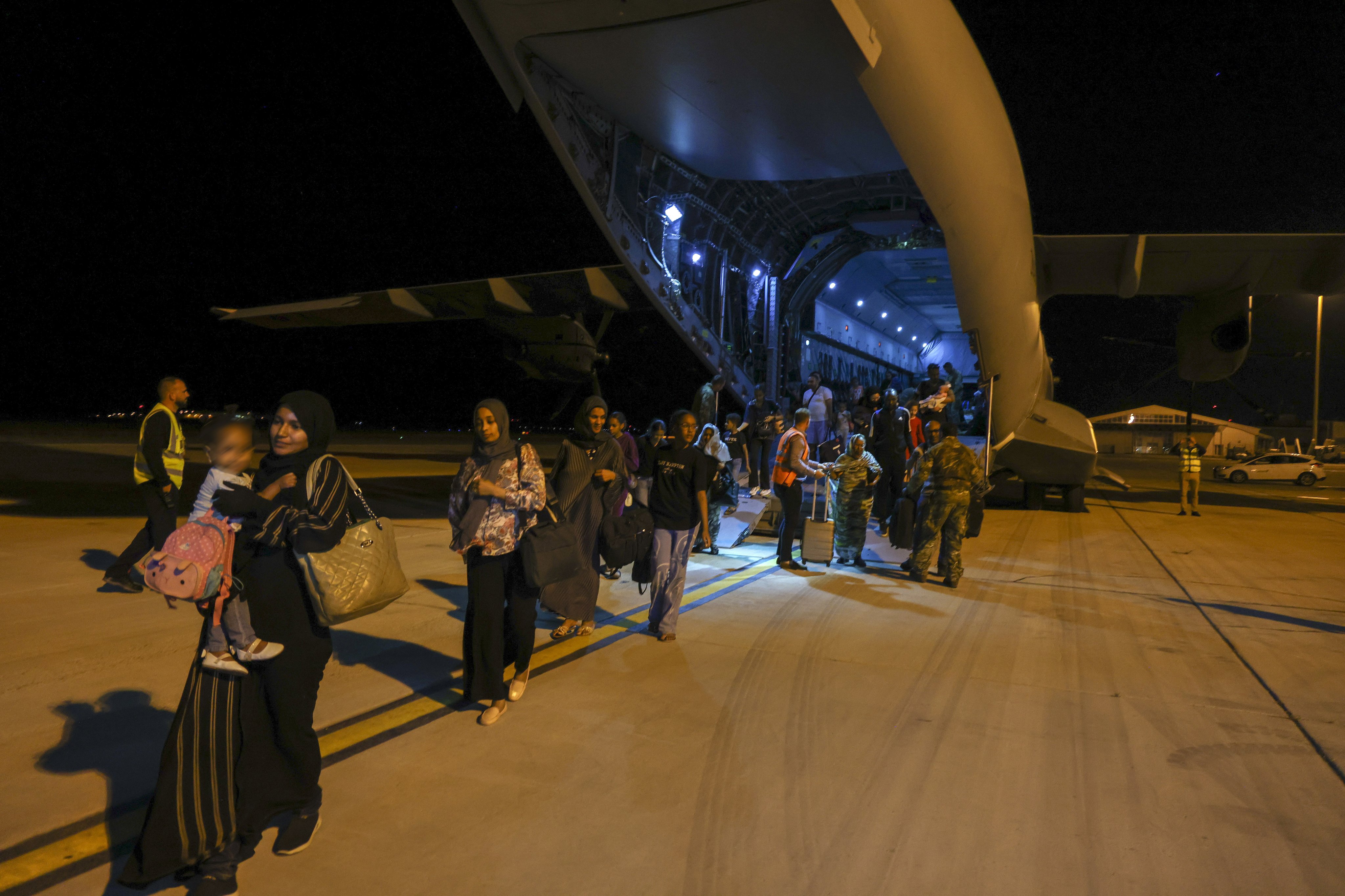 British nationals boarding an RAF aircraft after being evacuated from Sudan. Photo: EPA-EFE