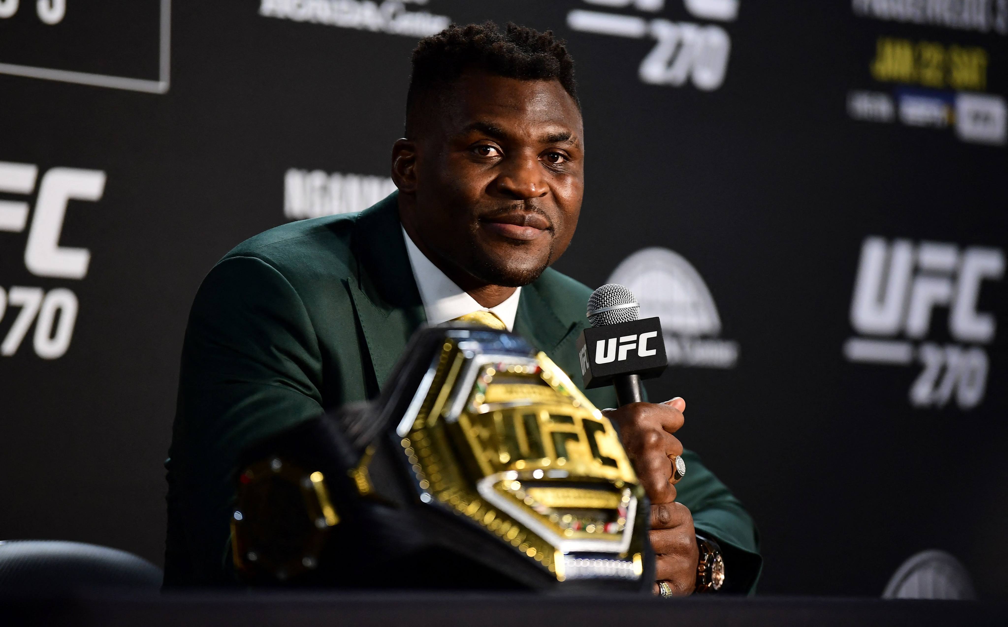 Francis Ngannou speaks to the media after defeating Ciryl Gane in their UFC 270 title fight. Photo: AFP