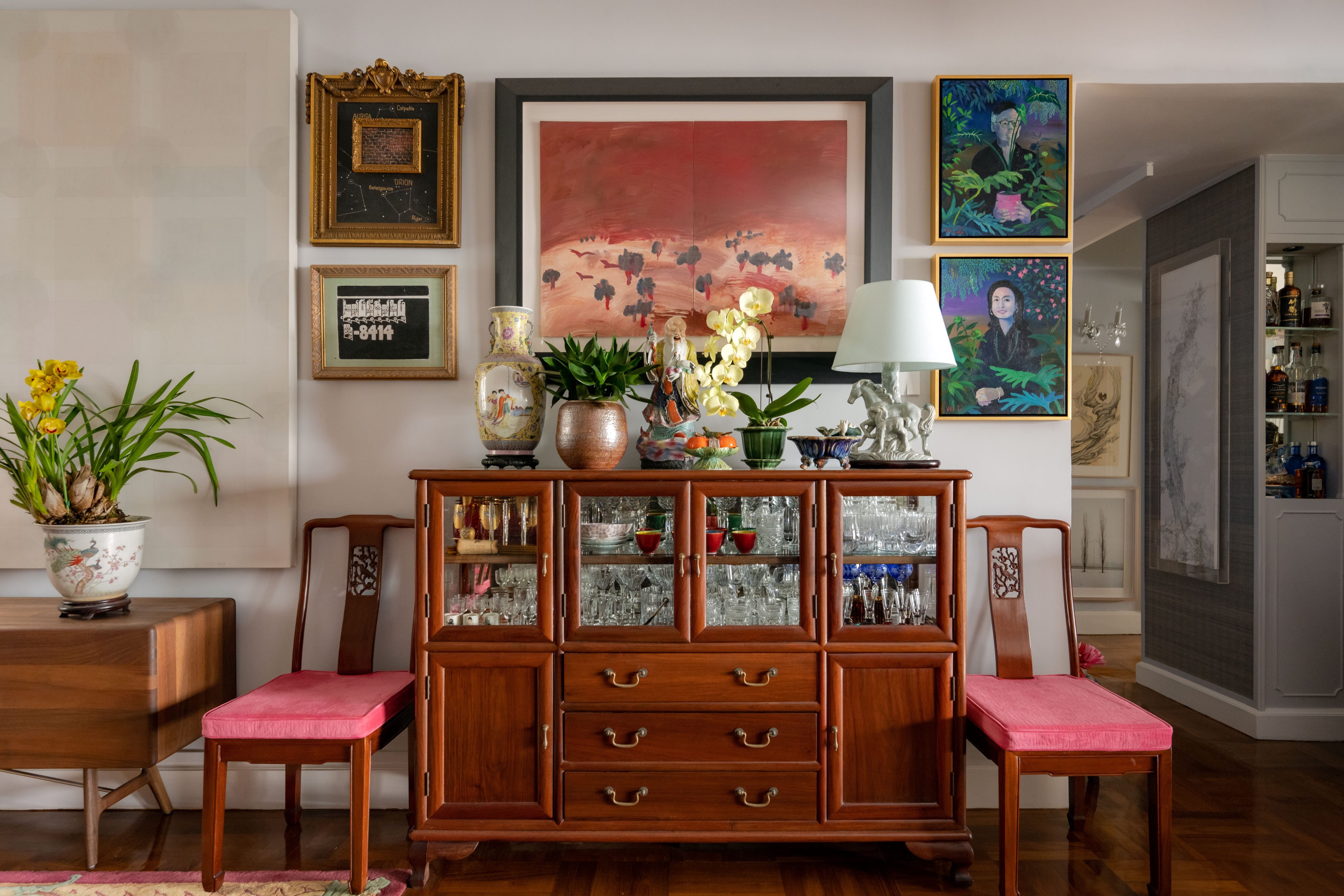 William Lim kept his parents’ rosewood cabinet and chairs when he renovoated their  Mid-Levels flat. Photo: Eugene Chan