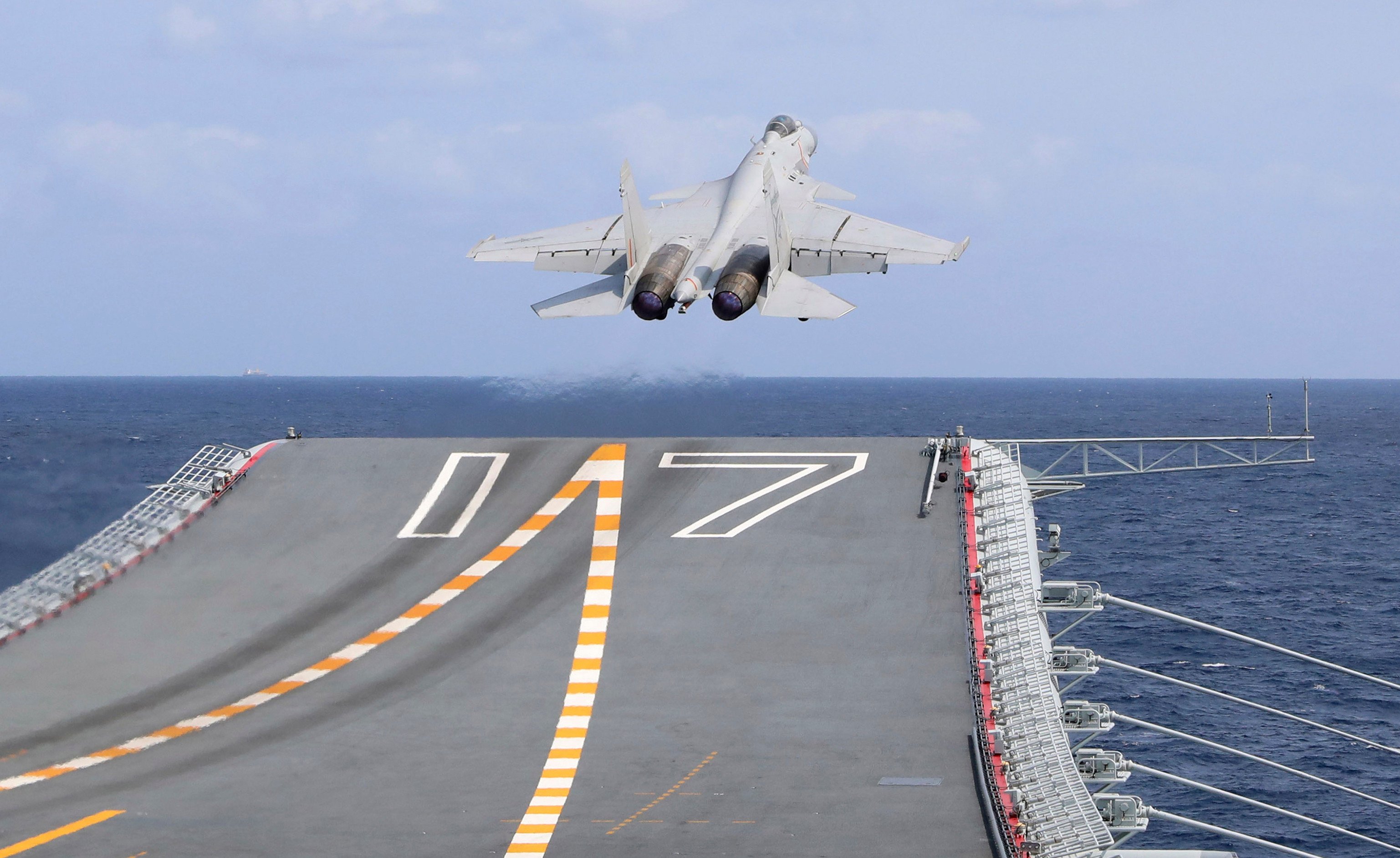 A J-15 Chinese fighter jet takes off from the Shandong aircraft carrier during exercises around Taiwan on April 9. Photo: Xinhua