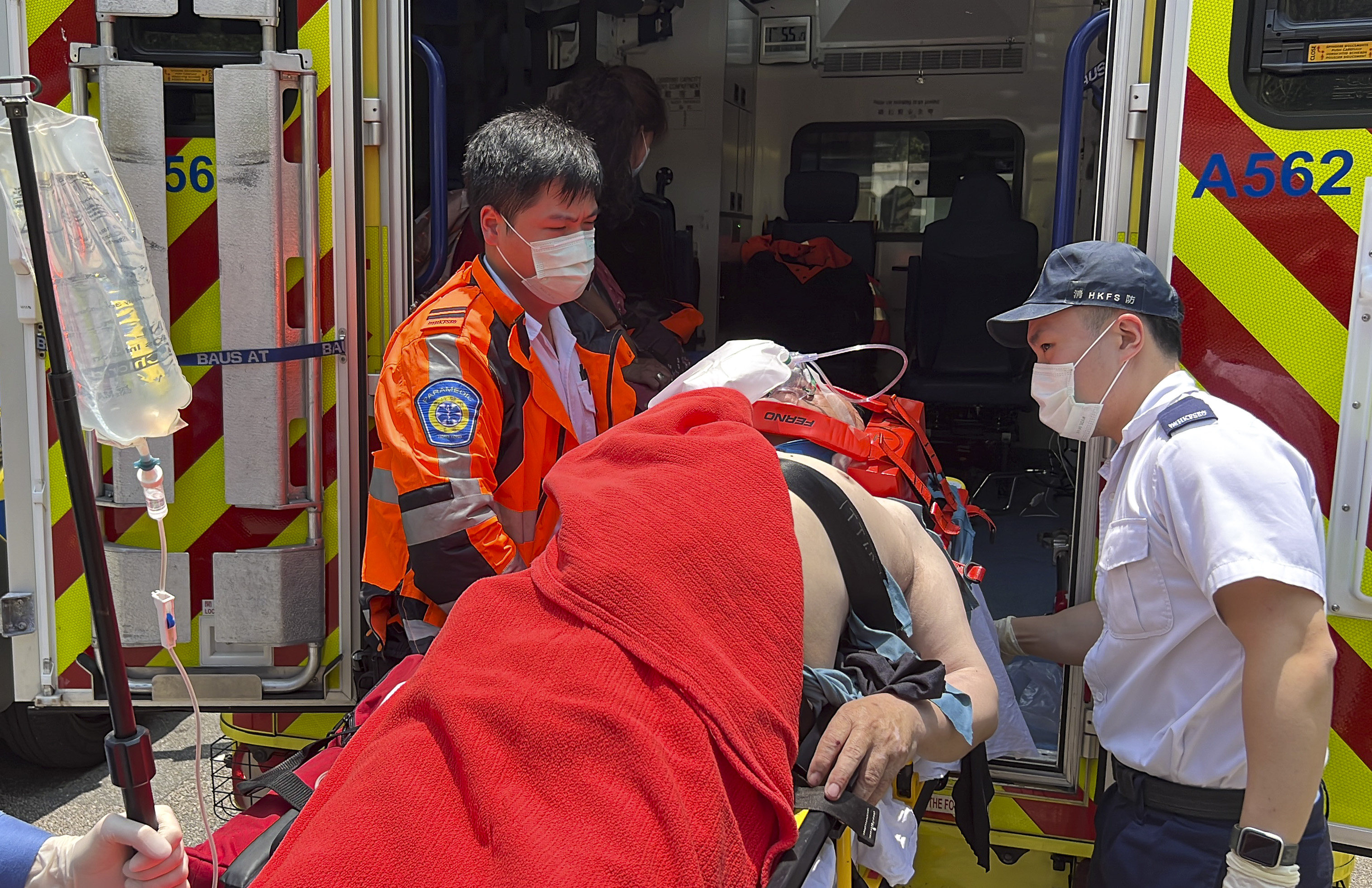 The 67-year-old man was semi-conscious when he was carried into an ambulance, according to police. Photo: Handout 