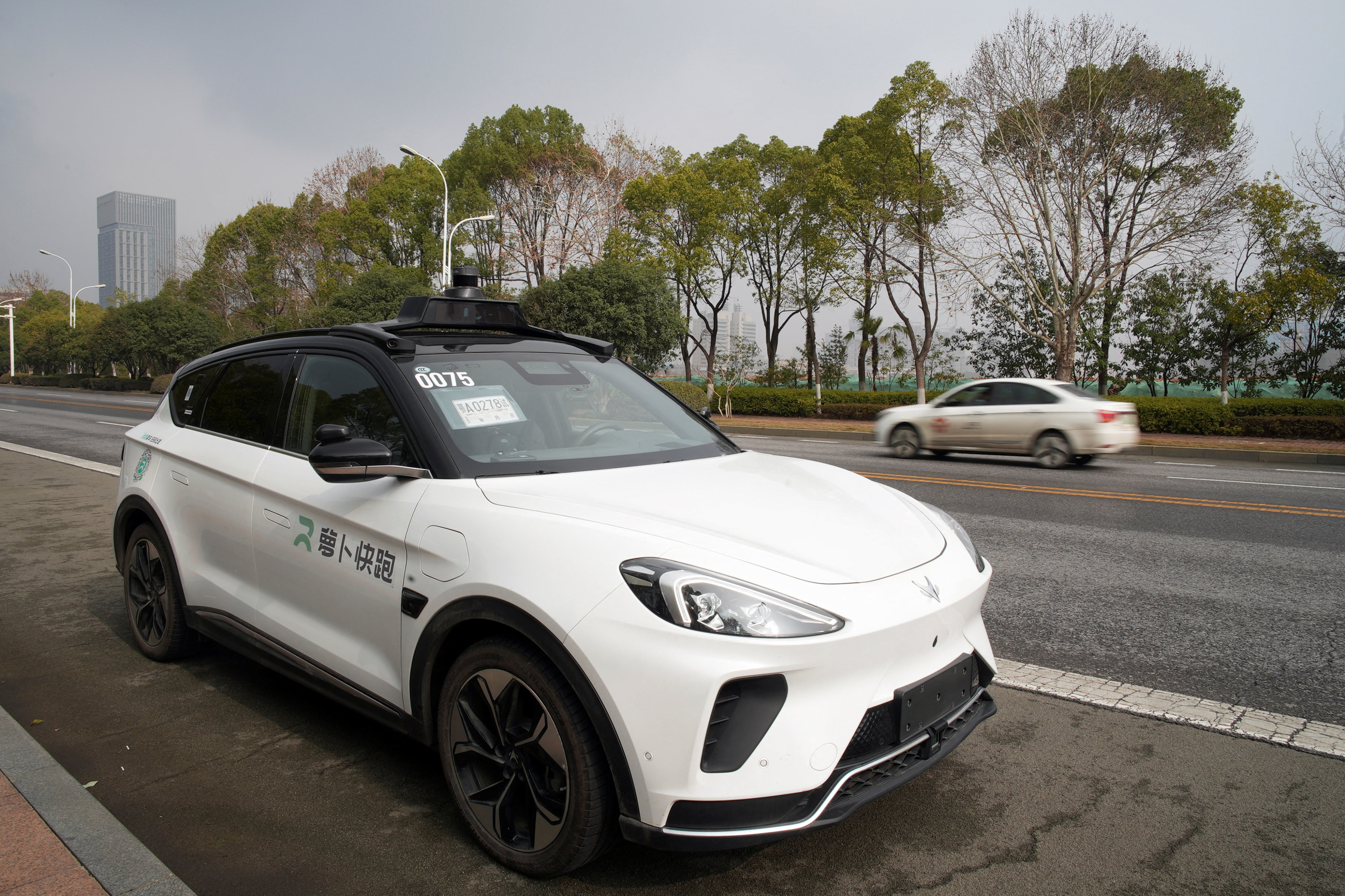 One of Baidu’s self-driving taxis is seen on a road in Wuhan, Hubei province, on February 24. Photo: Reuters 