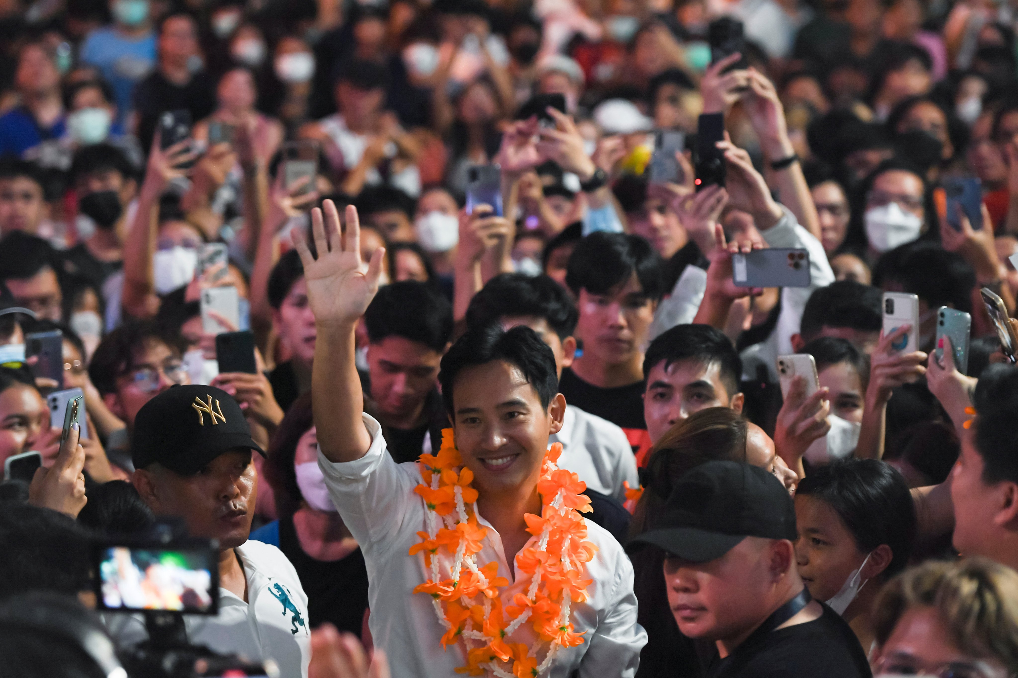 Pita Limjaroenrat from the Move Forward Party waves to supporters during an election campaign rally in Bangkok. Photo: Reuters