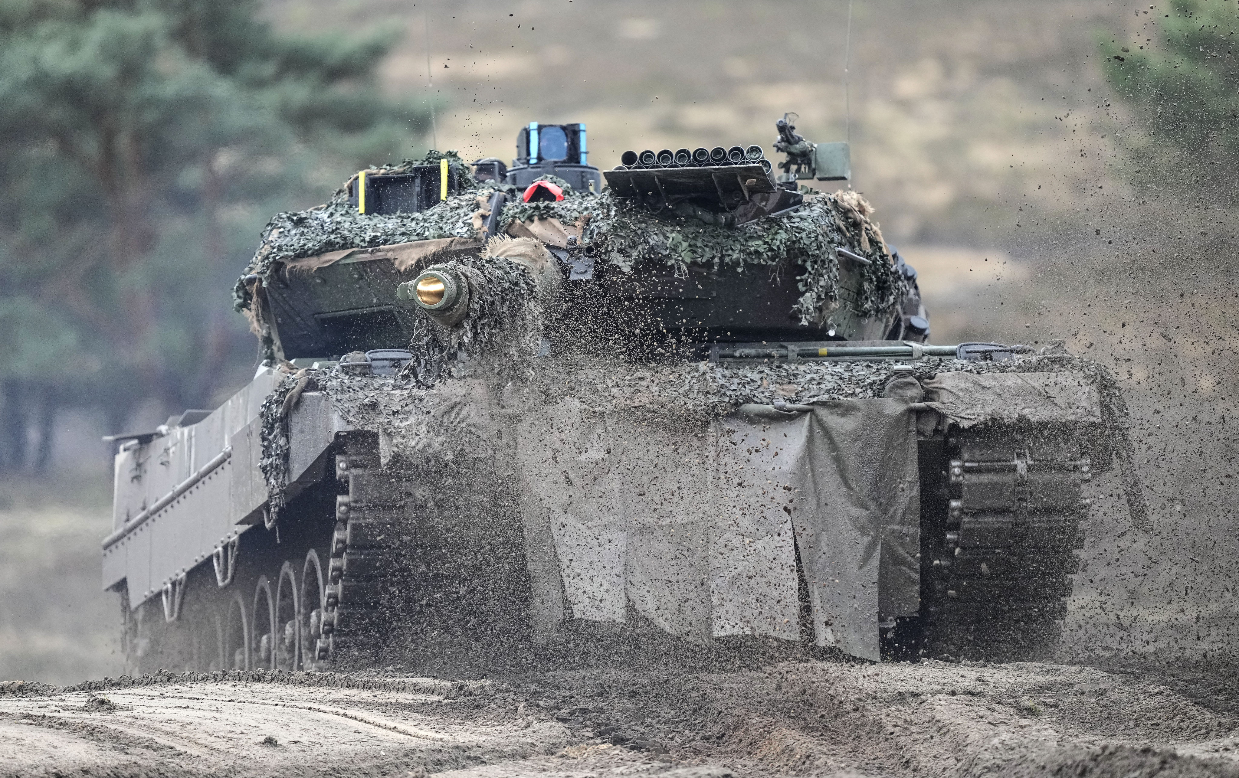 A Leopard 2 tank undergoes drills at the Bundeswehr tank battalion 203 at the Field Marshal Rommel Barracks in Augustdorf, Germany, on February 1. An independent Sweden-based watchdog says world military spending has grown for the eighth consecutive year to an all-time high of US$2.24 trillion, with 13 per cent of the rise taking place in Europe, chiefly because of Russian and Ukrainian spending. Photo: AP
