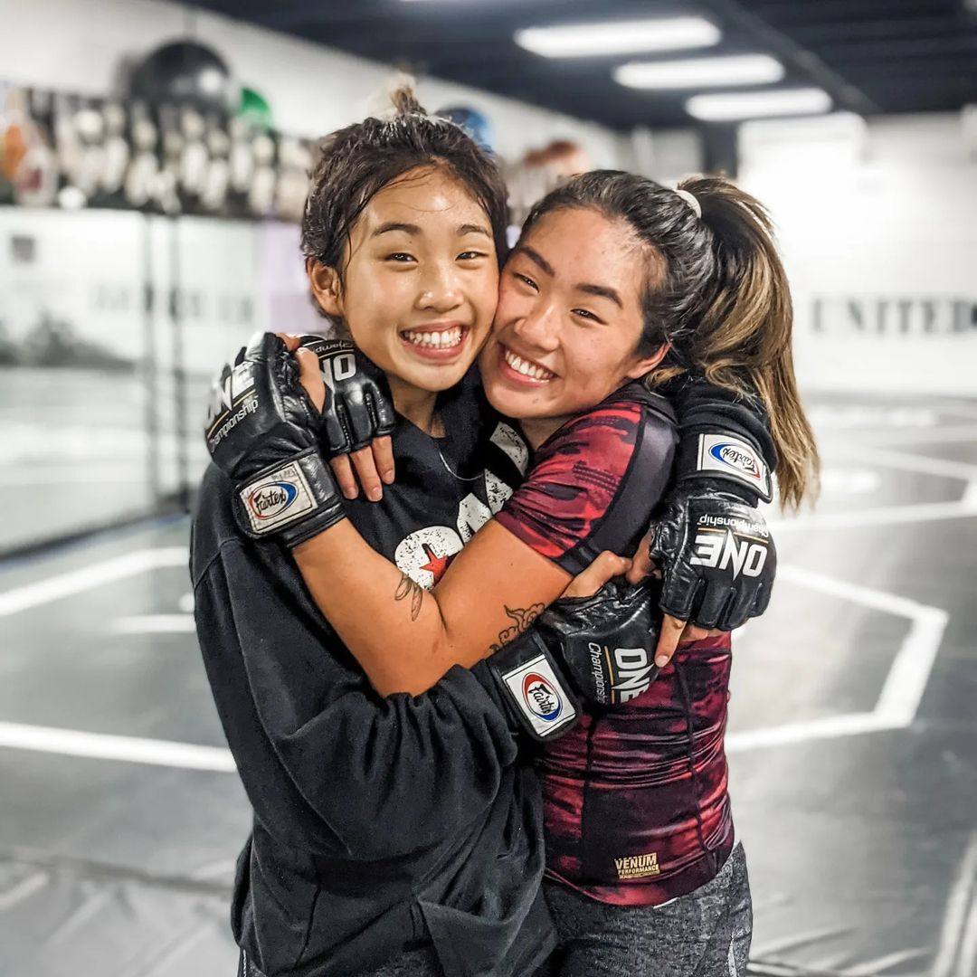 Angela Lee (right) with her sister Victoria Lee during training at their family’s United MMA gym in Hawaii. Photo: Instagram/@angelaleemma