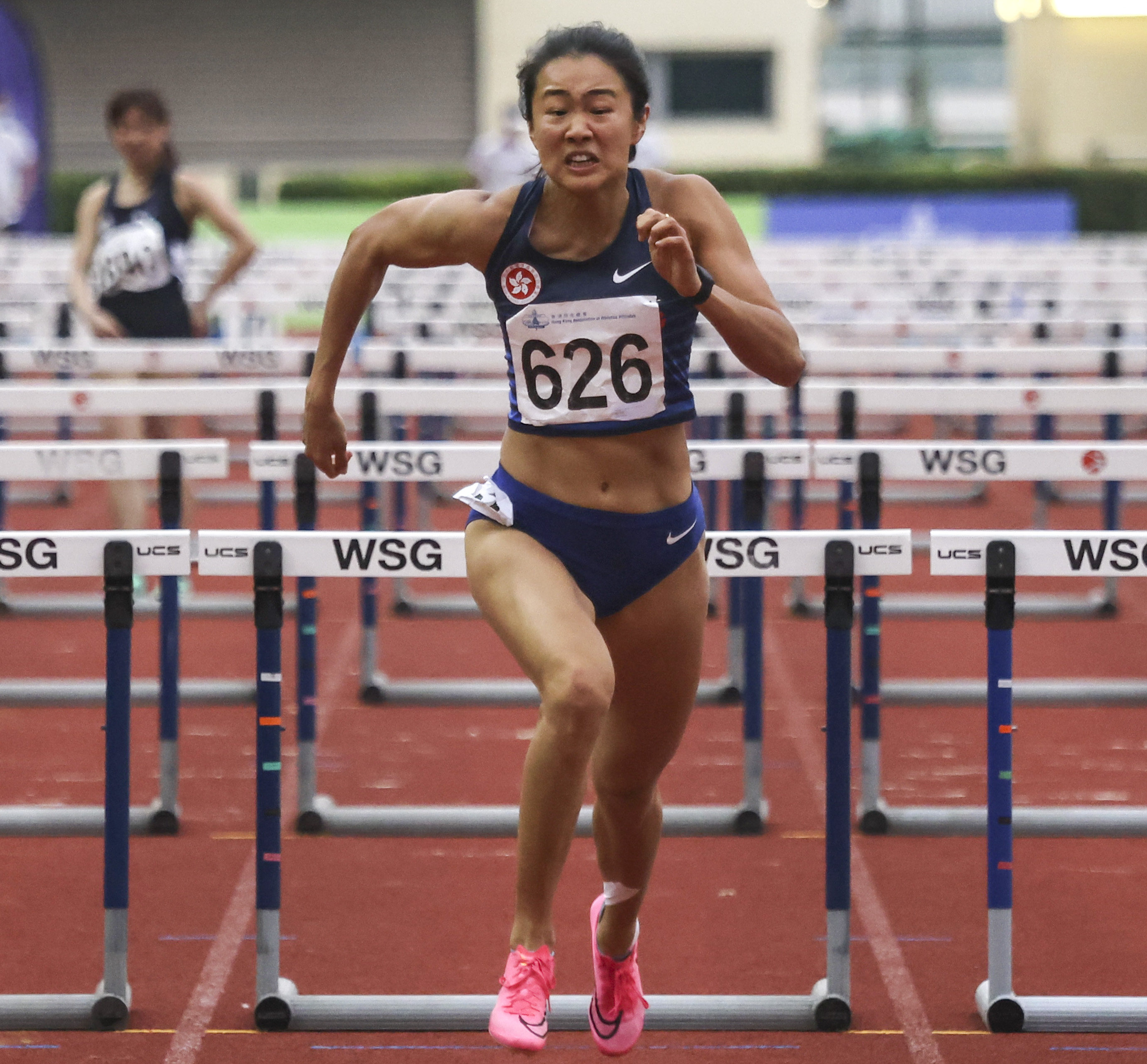 Vera Lui Lai-yiu during the Hong Kong Athletics Championships women’s 100m hurdles at Wan Chai Sports Ground. Photo: Jonathan Wong