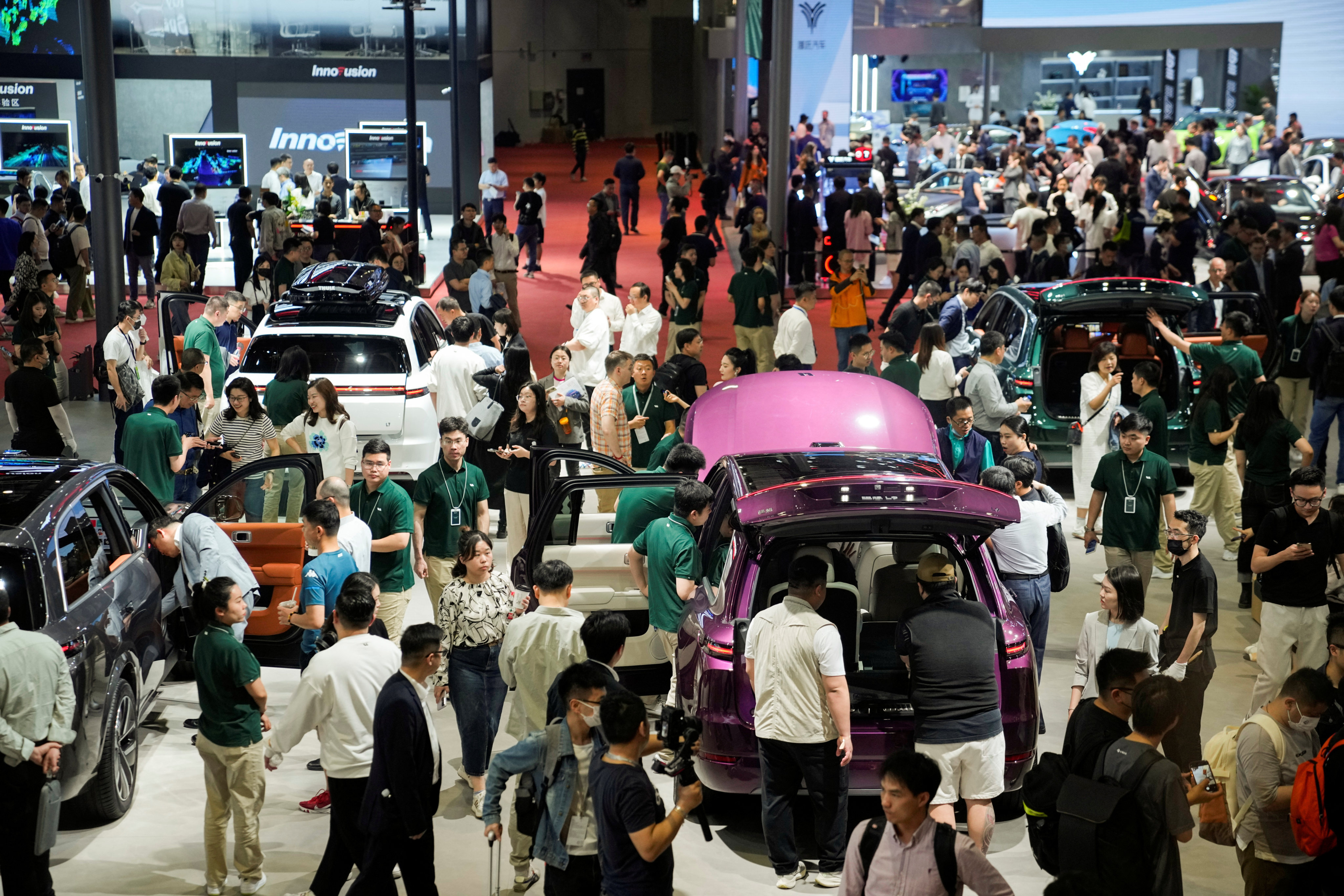 People visit at the Li Auto booth at the Shanghai Auto Show on April 19, 2023. Photo: Reuters