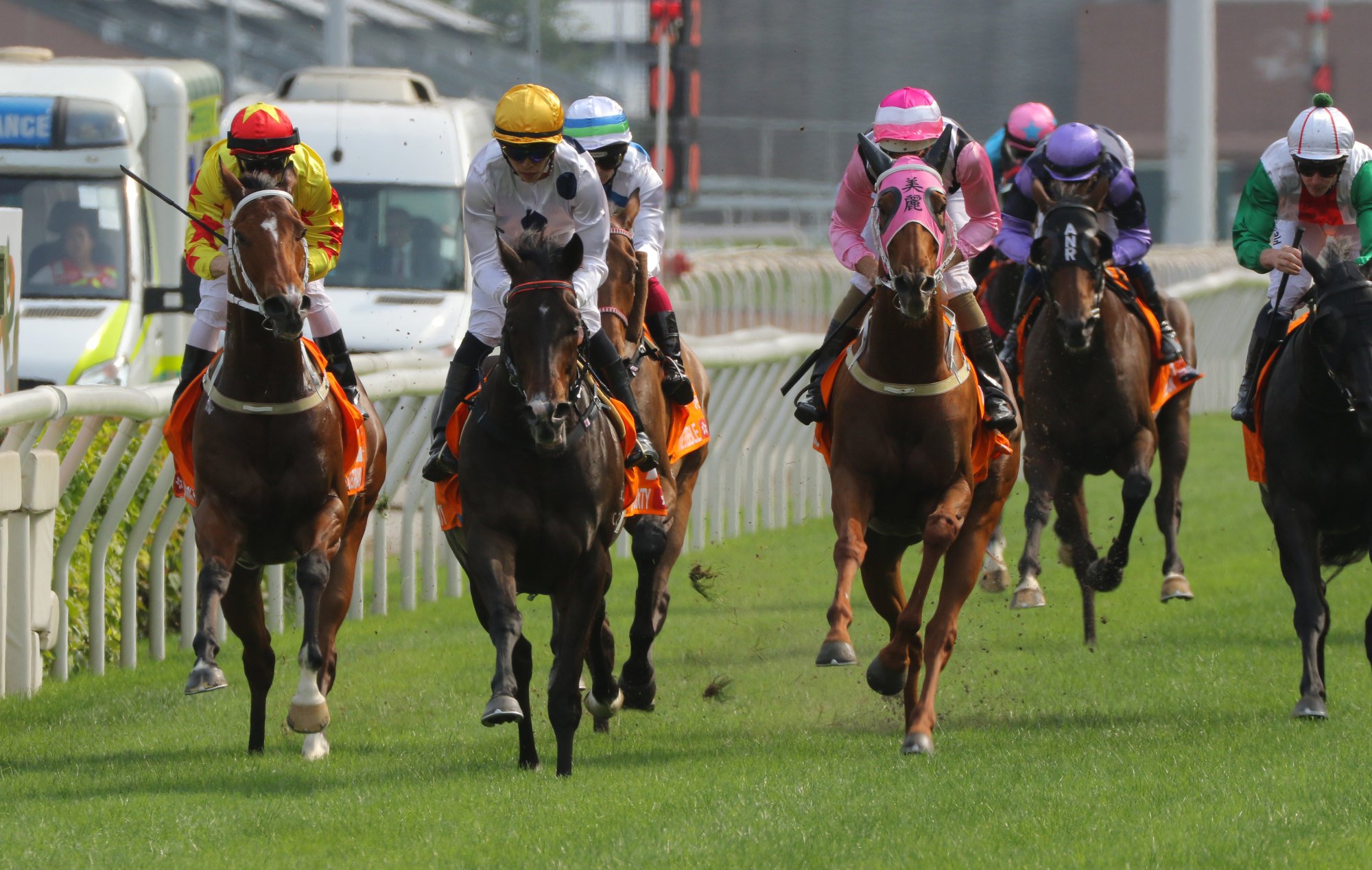 Golden Sixty (yellow cap) wins the Champions Mile at Sha Tin on Sunday.