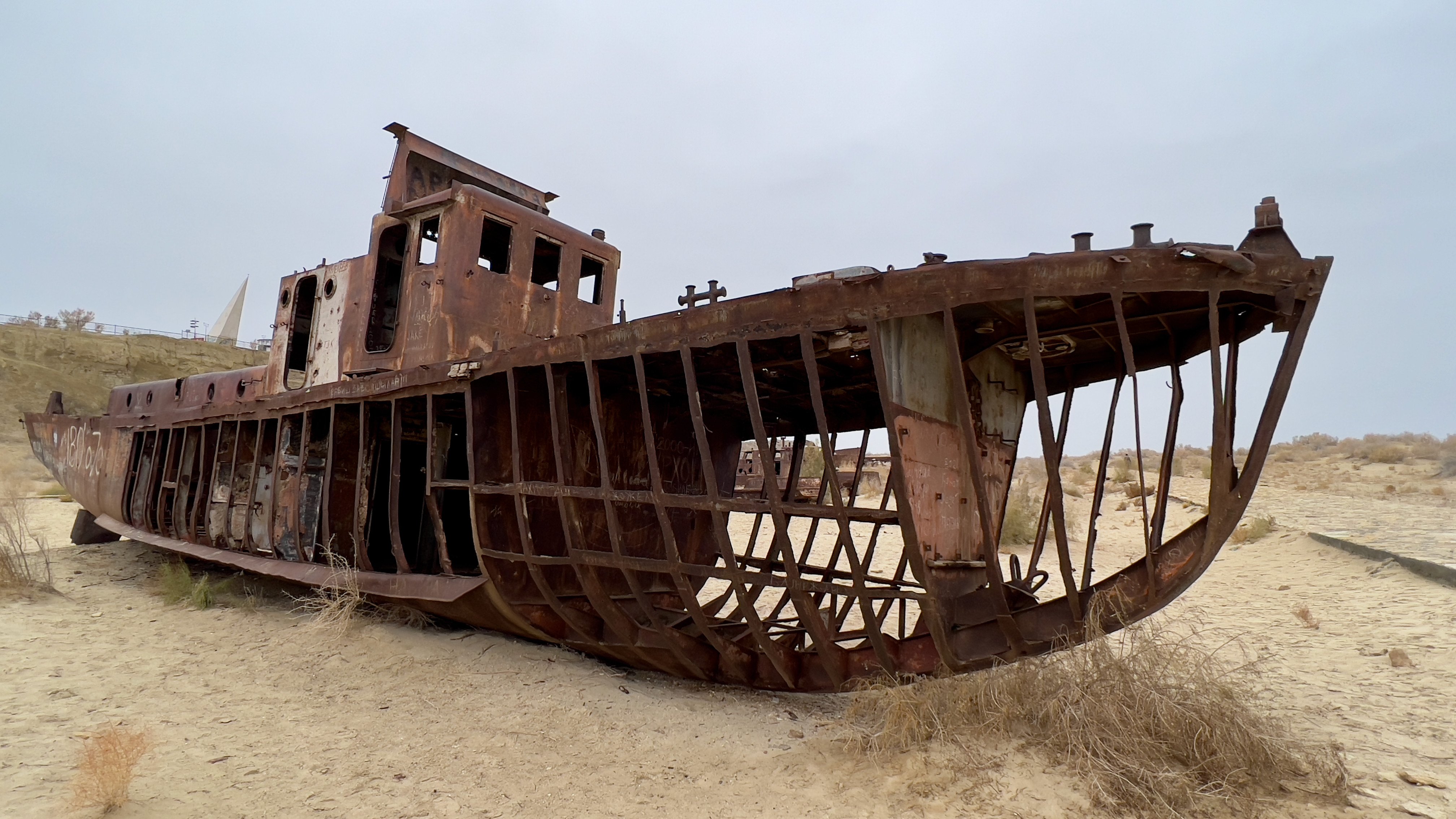 The shell of a fishing boat in the once lively town of Moynaq, in Uzbekistan. The Aral Sea’s slow destruction devastated the community, but now offers Instagrammable photo opportunities for disaster-tourism enthusiasts. Photo: Peter Neville-Hadley