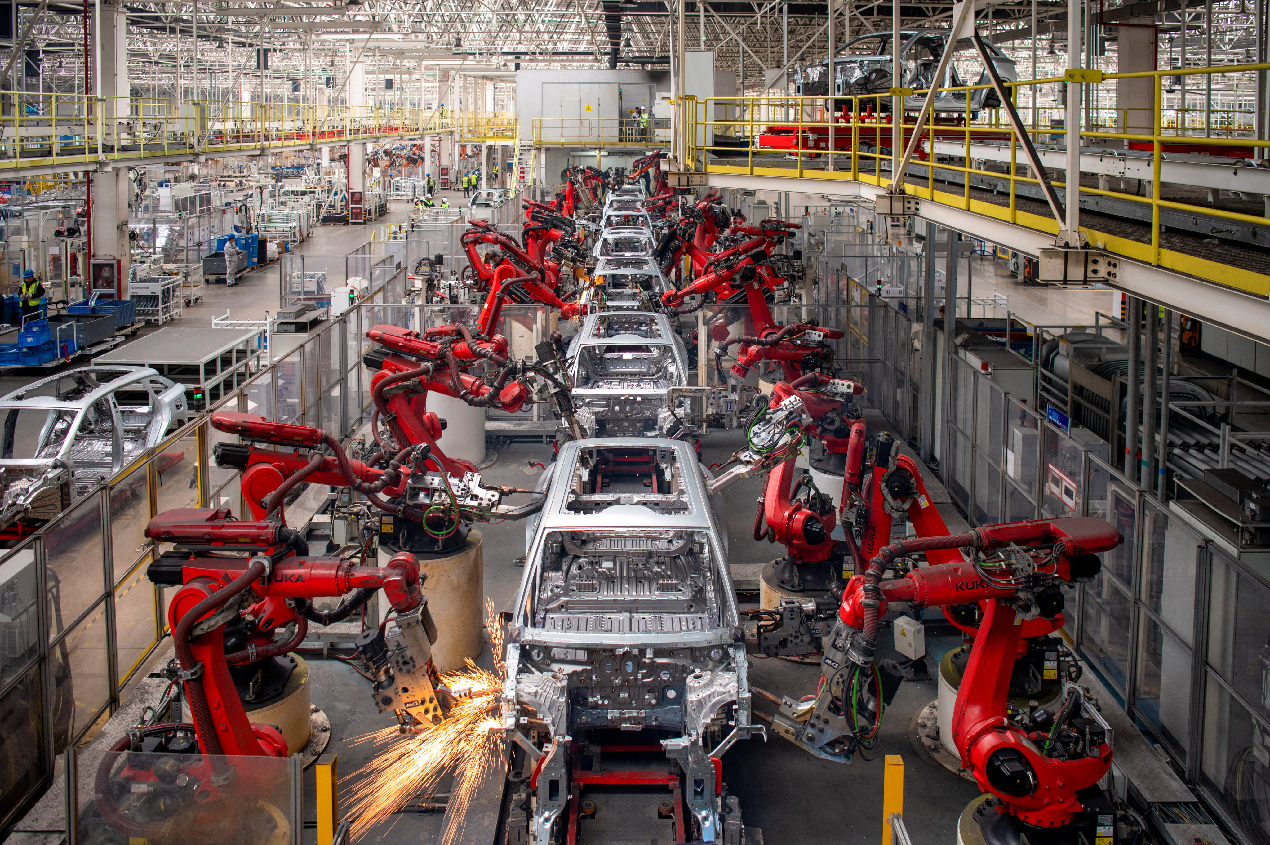 Robotic arms assemble cars on the production line for Leapmotor’s electric vehicles at a factory in Jinhua, Zhejiang province, on April 26. Photo: Reuters