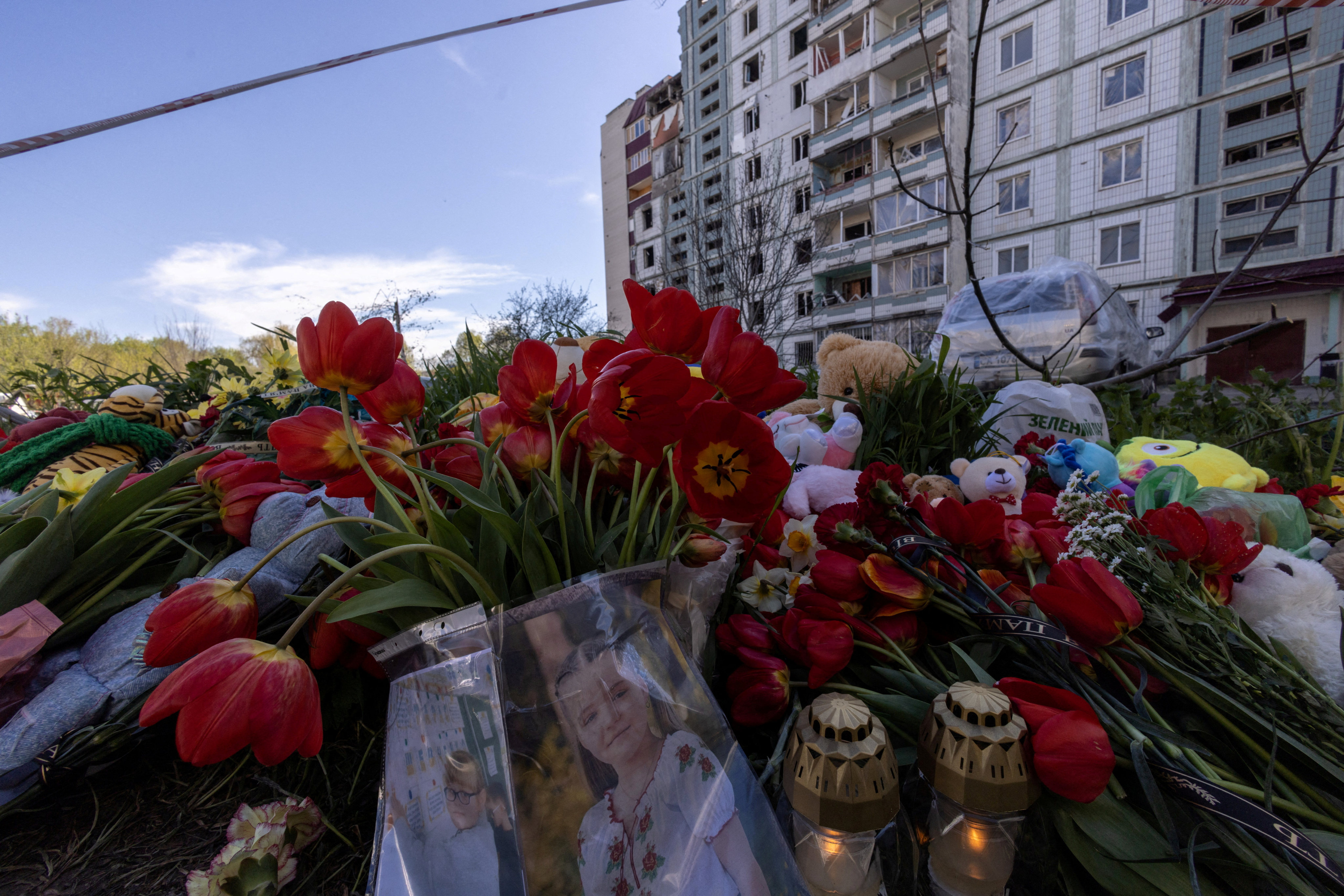 Pictures of Sofia and Alina, two young children killed by a Russian missile strike, are seen in the town of Uman, in the Cherkasy region of Ukraine, on Saturday. Photo: Reuters