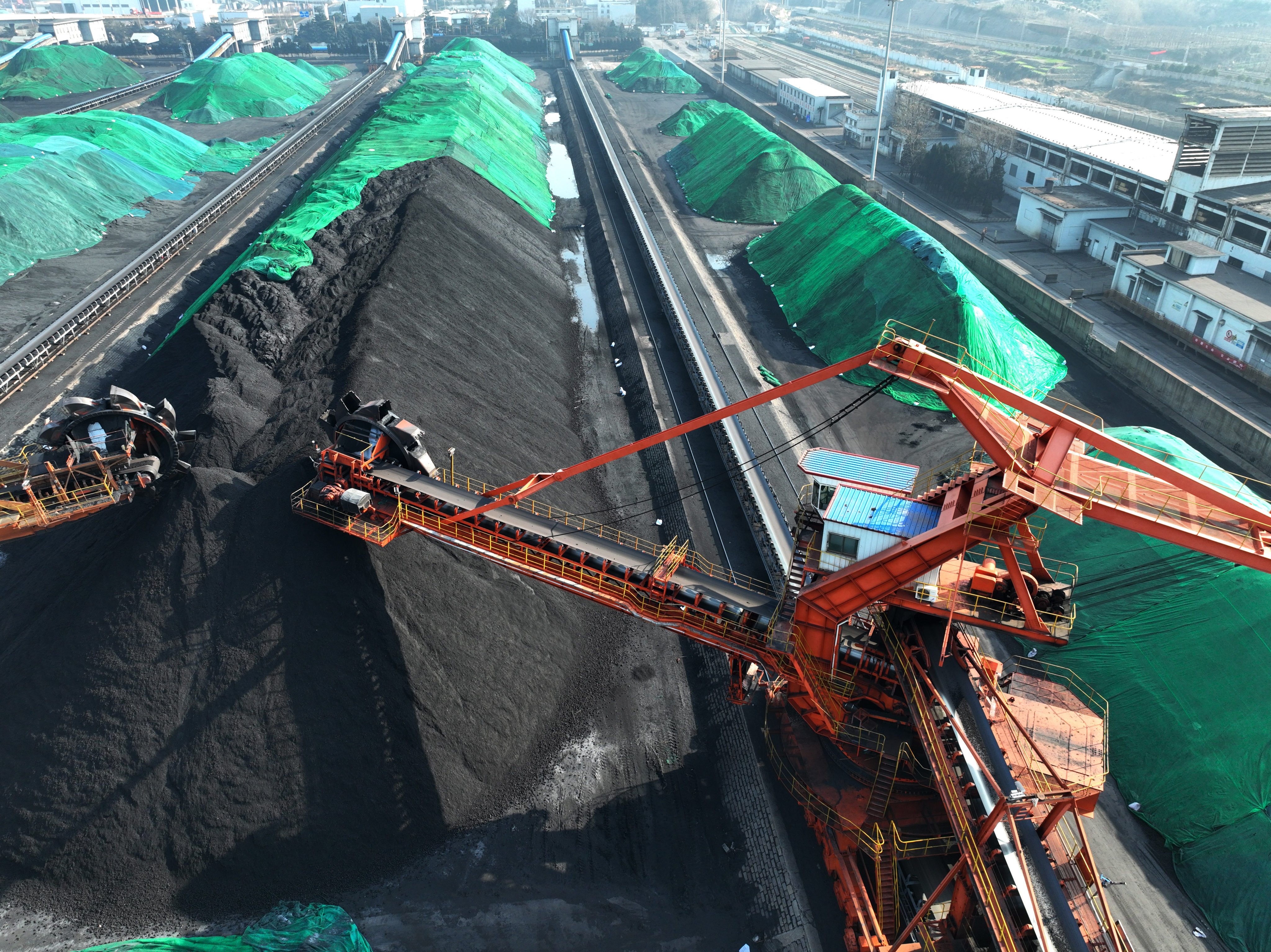 Conveyor belts transport coal into piles at Lianyungang port in China’s eastern Jiangsu province. Photo: VCG via Getty Images
