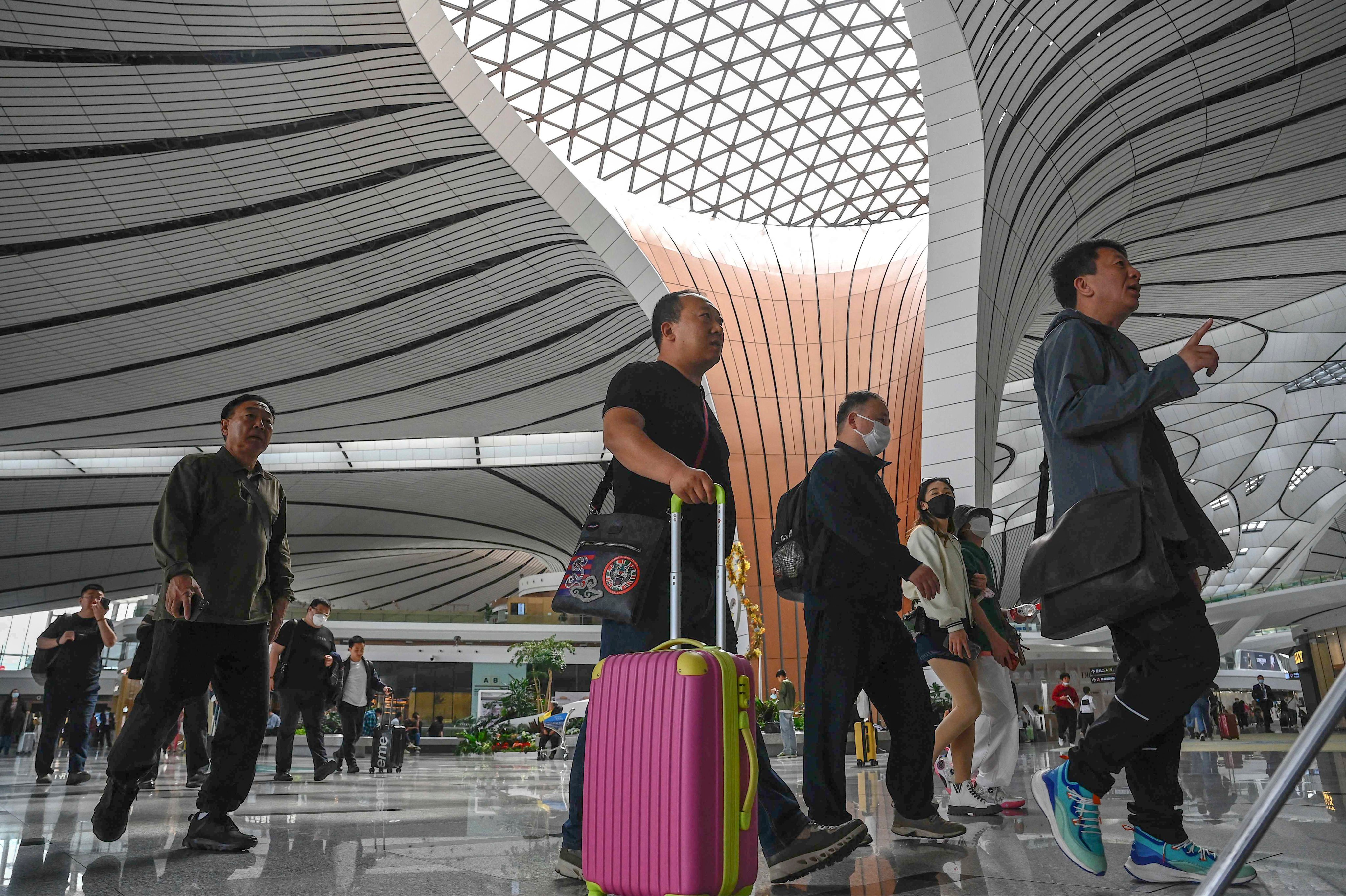 Frustrated by three years of restrictions, Chinese travellers flew further afield and in far greater numbers than at any time since 2019. Photo: AFP