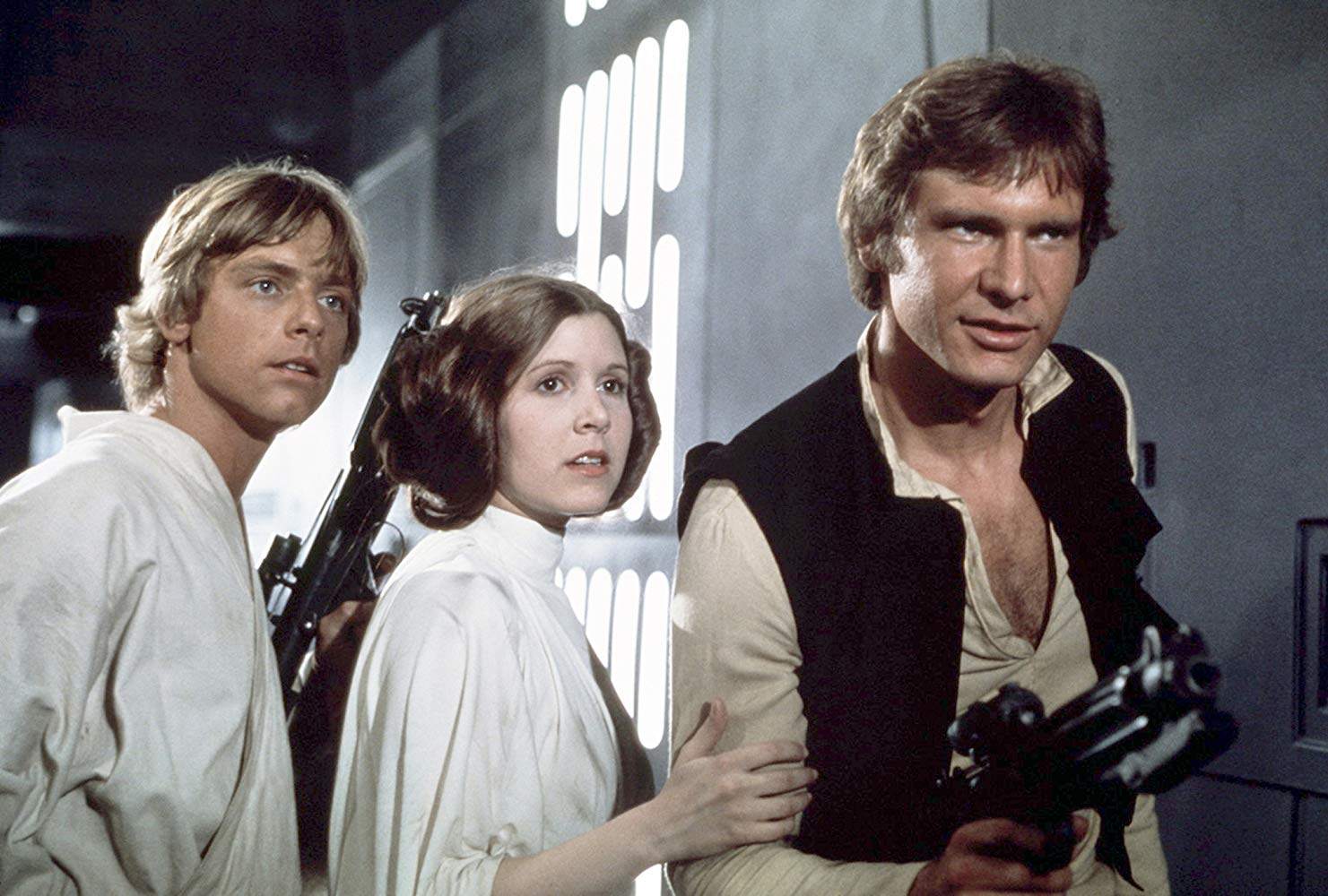 (From left) Mark Hamill, Carrie Fisher and Harrison Ford in Star Wars (1977). May 4 is Star Wars Day. Photo: 20th Century Fox films