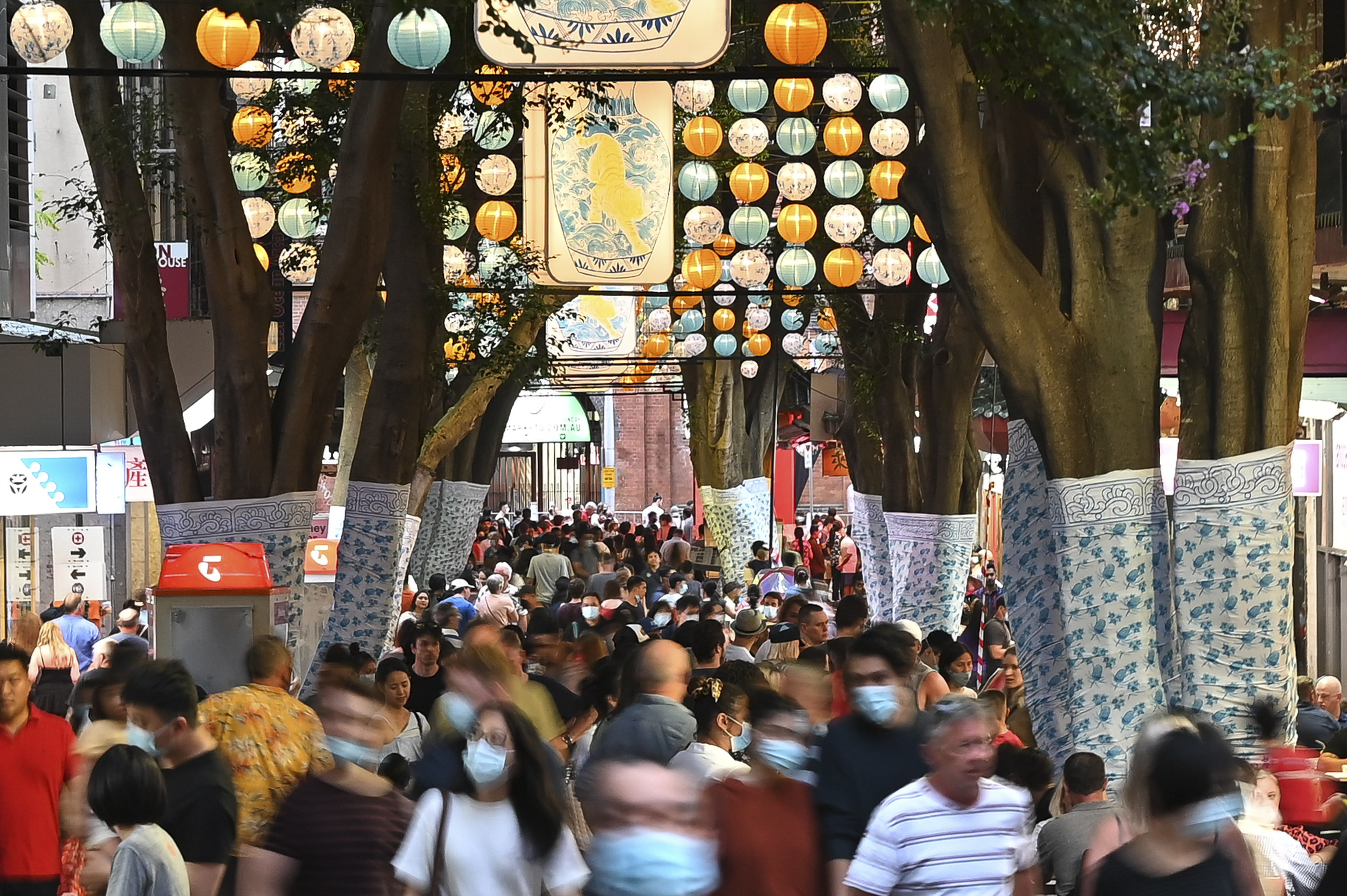 Lanterns hang from above as crowds flock to Dixon Street Mall as part of the Lunar New Year celebrations in Chinatown, Sydney, Australia, on January 29, 2022. While 54 per cent of Chinese-Australians are concerned about Chinese influence on Australia’s political processes, 62 per cent are concerned about US influence on the same. Photo: Anadolu Agency via Getty Images