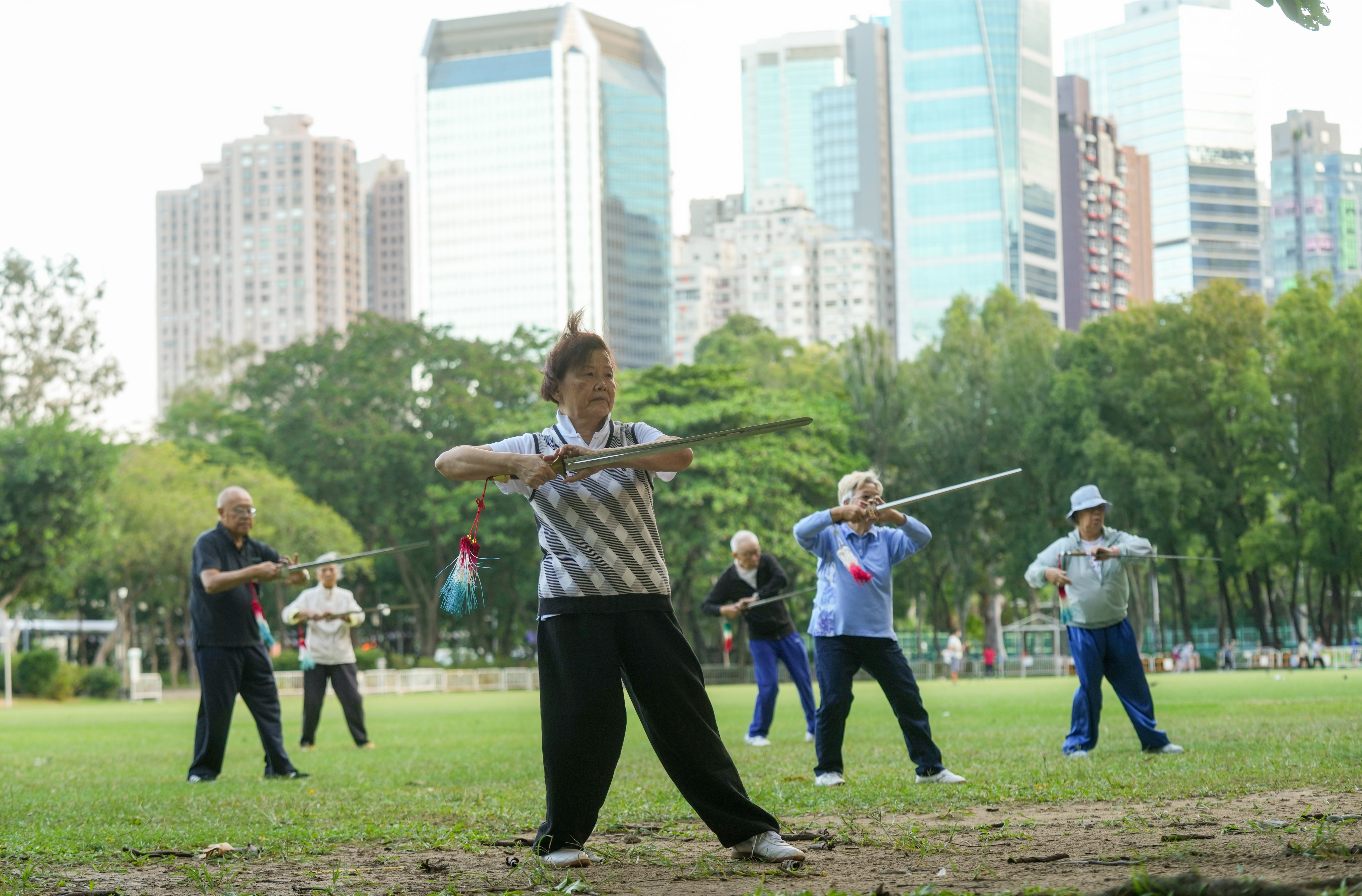 Older people practise the tai chi sword at Victoria Park in Causeway Bay in 2022. Forced retirement by 65 is anachronistic when Hong Kong’s life expectancy is 85 years. Photo: Sam Tsang  